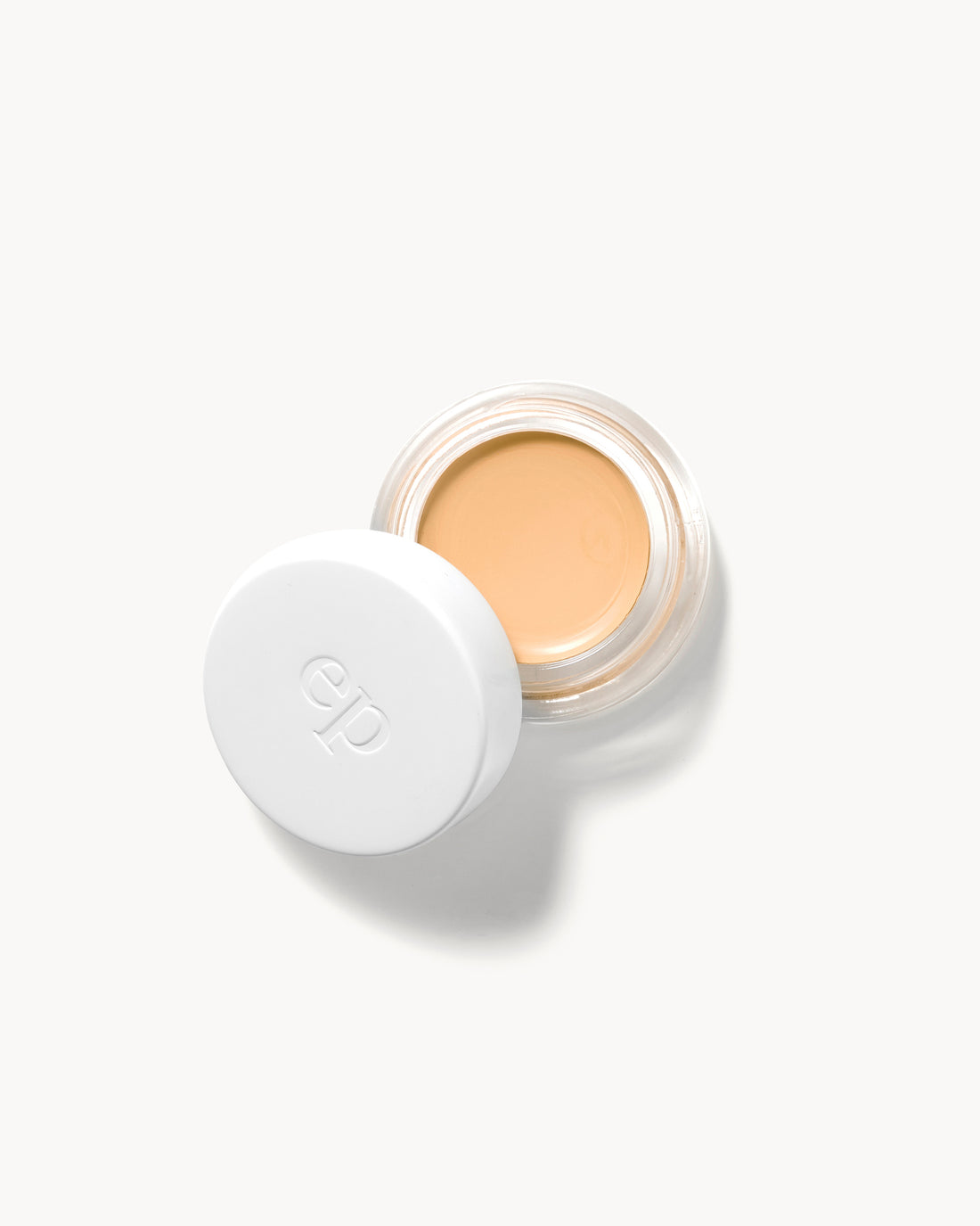 arnica all cover pot in a white container with a visible brand logo on a white background