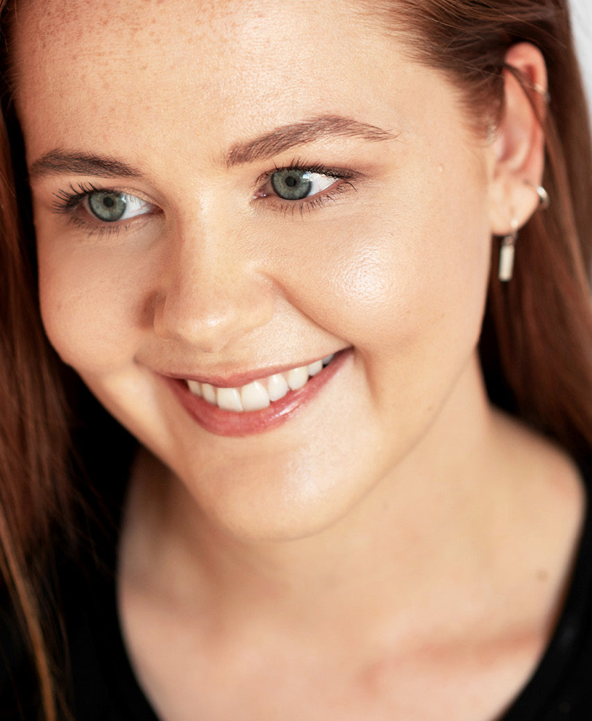 Gentle, all-natural arnica concealer applied on skin for even complexion