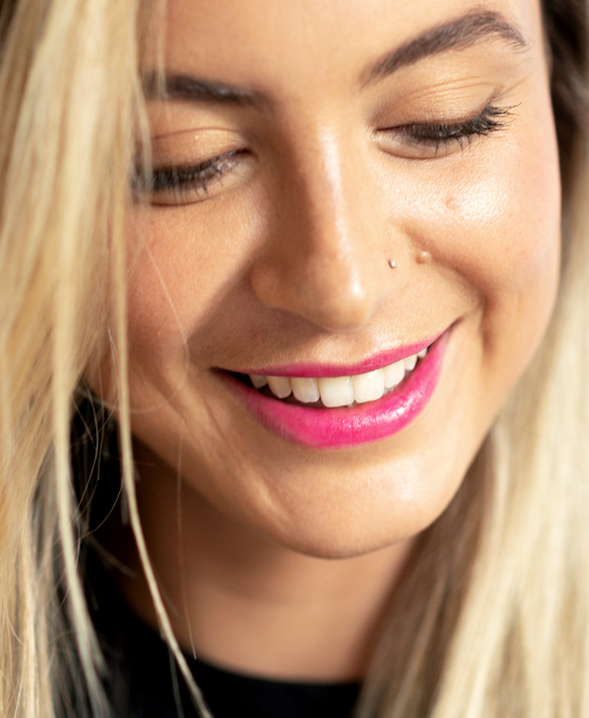 cruelty-free beetroot cheek & lip tint by Ere Perez applied overall for its natural pigmented look