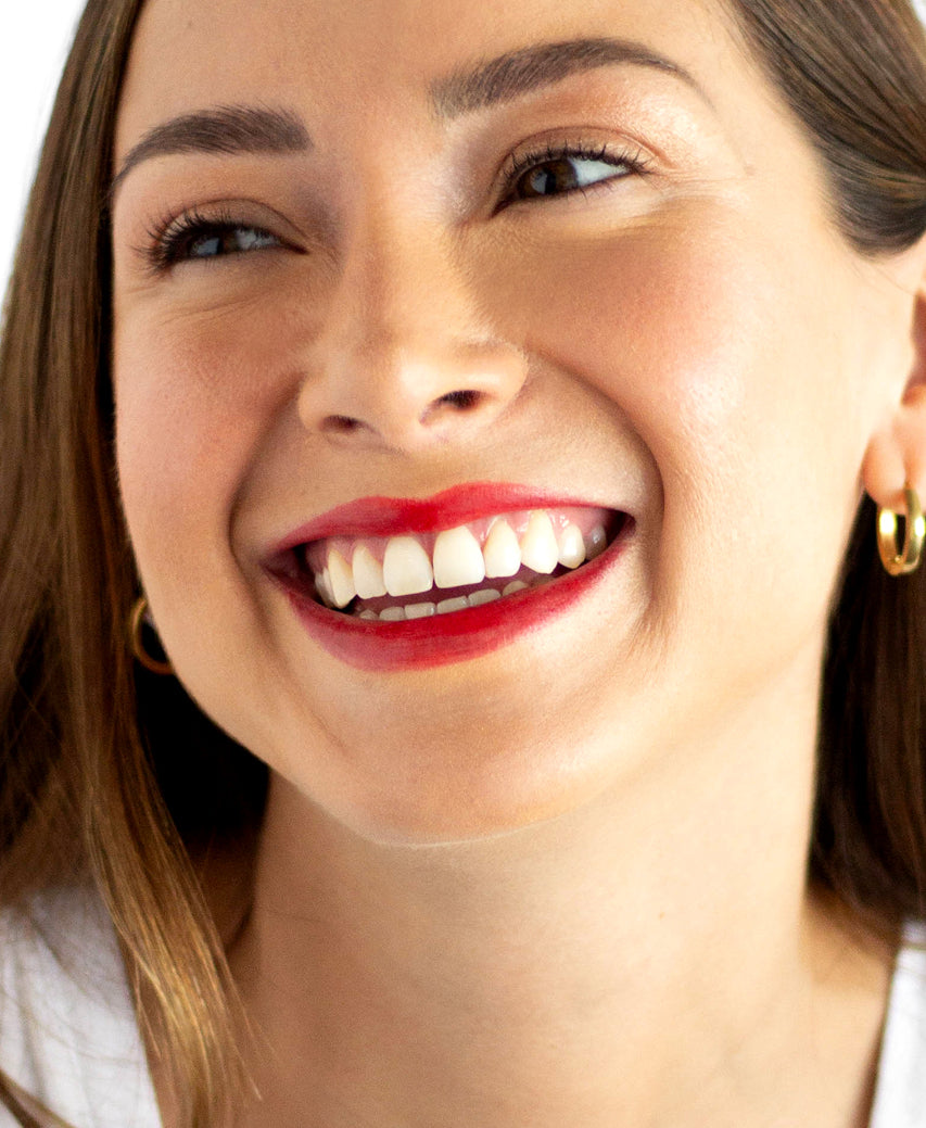 Ere Perez natural & plastic free beetroot cheek & lip tint worn on skin for a bright natural pigment