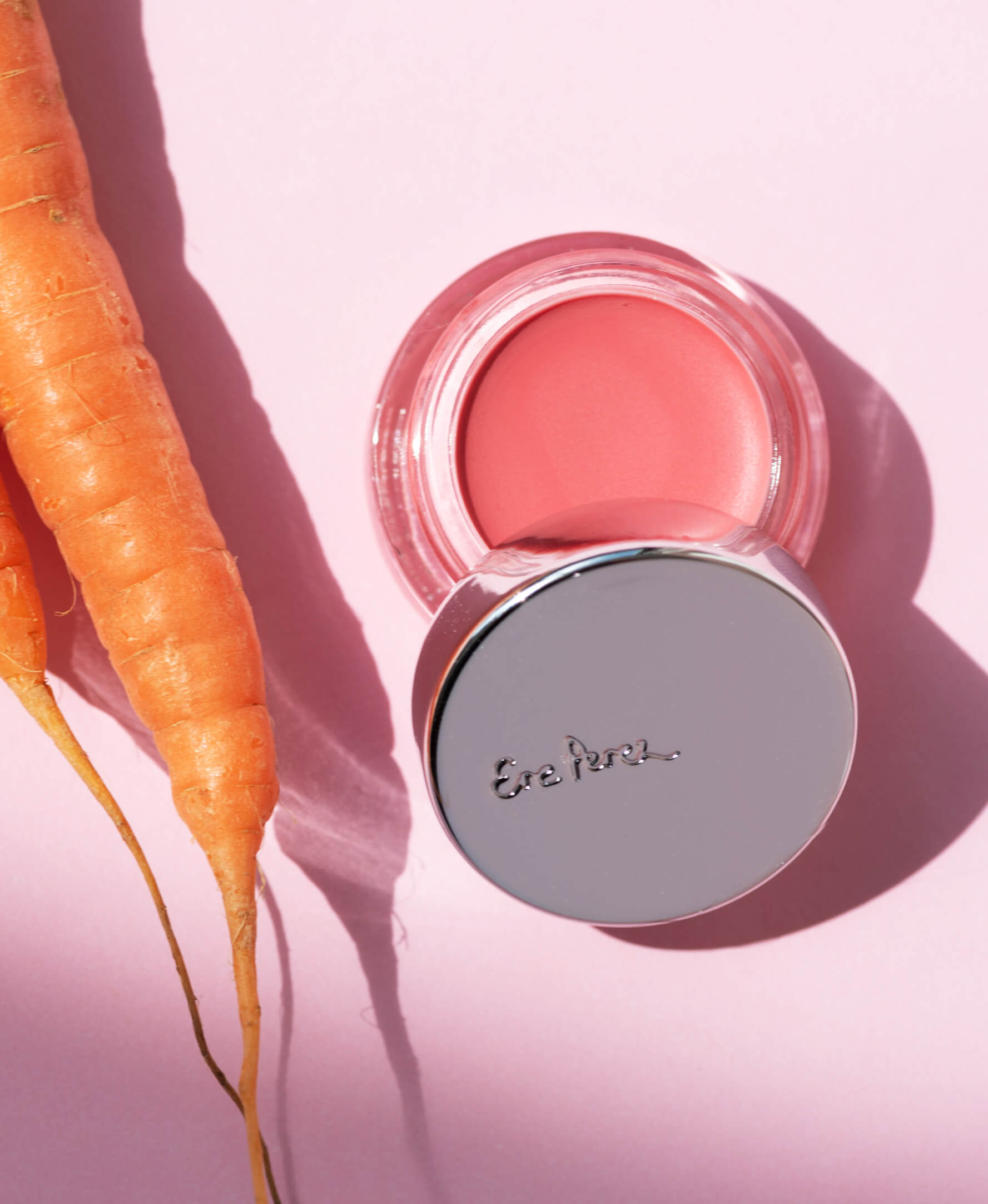 Ere Perez multi-use & plastic free carrot colour pot, to add a pop of colour to the skin