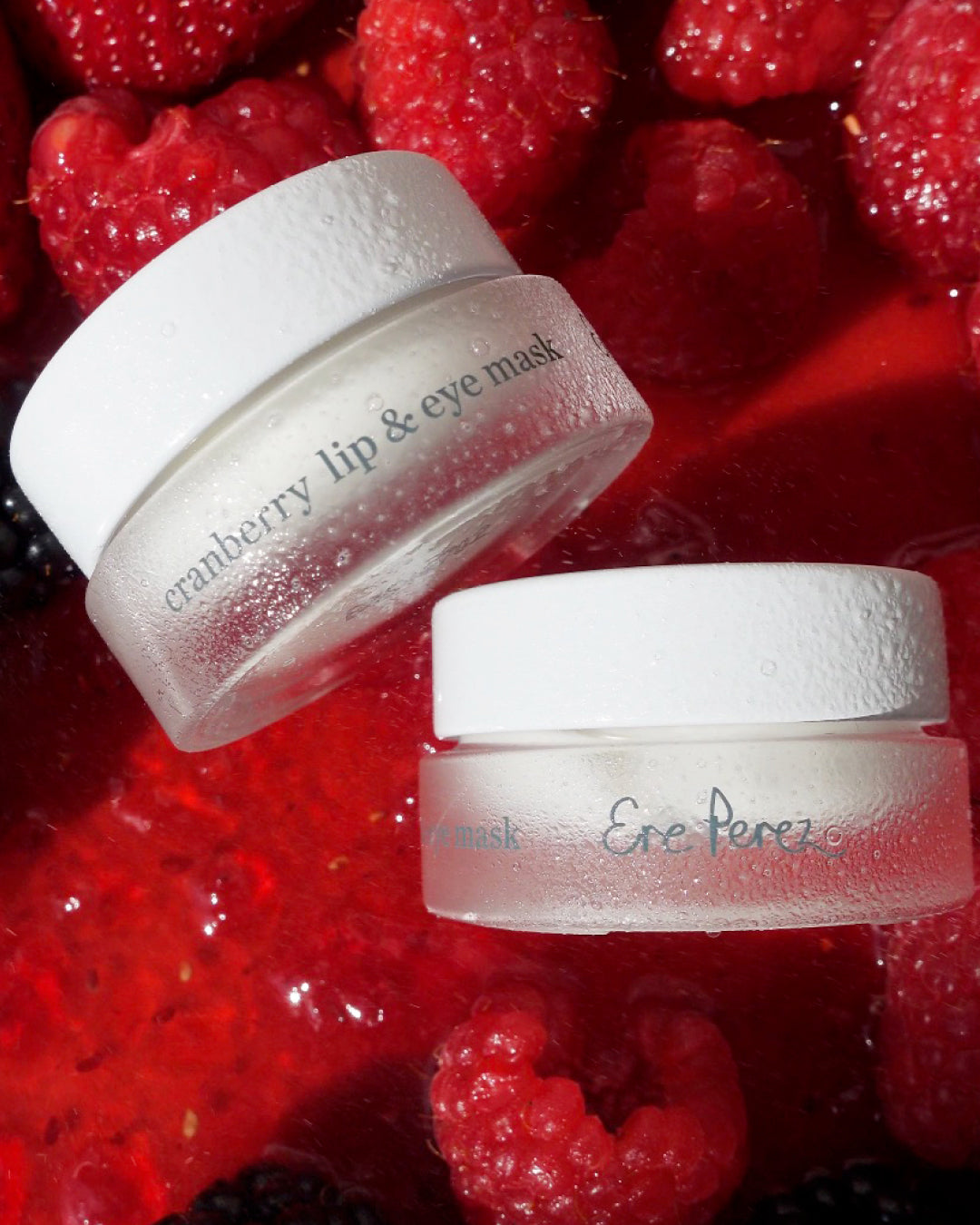 multiple pots of all-natural cranberry lip & eye mask by Ere Perez