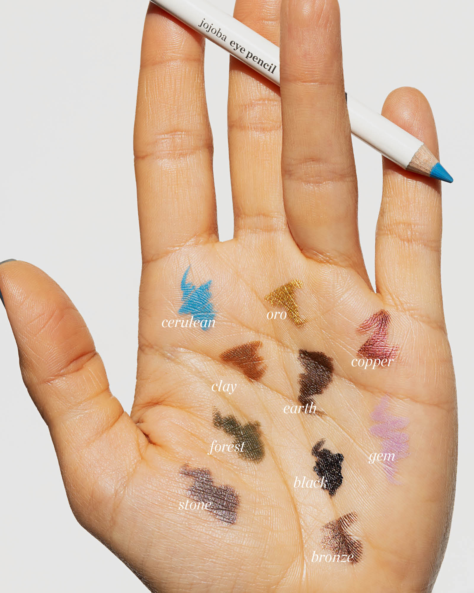 swatches of jojoba eye pencil Ere Perez on hand