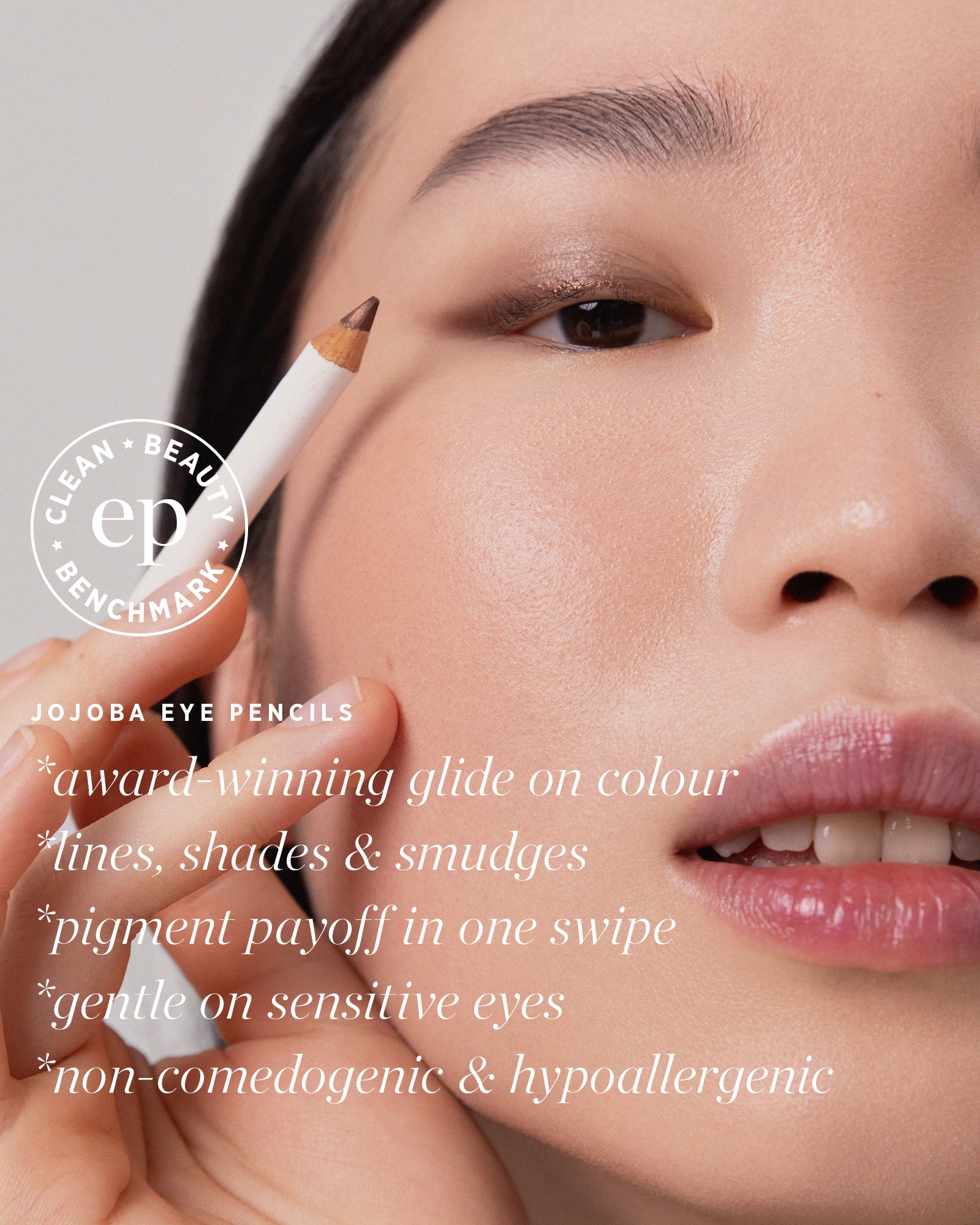 model wearing jojoba eye pencil Ere Perez with features of the pencil