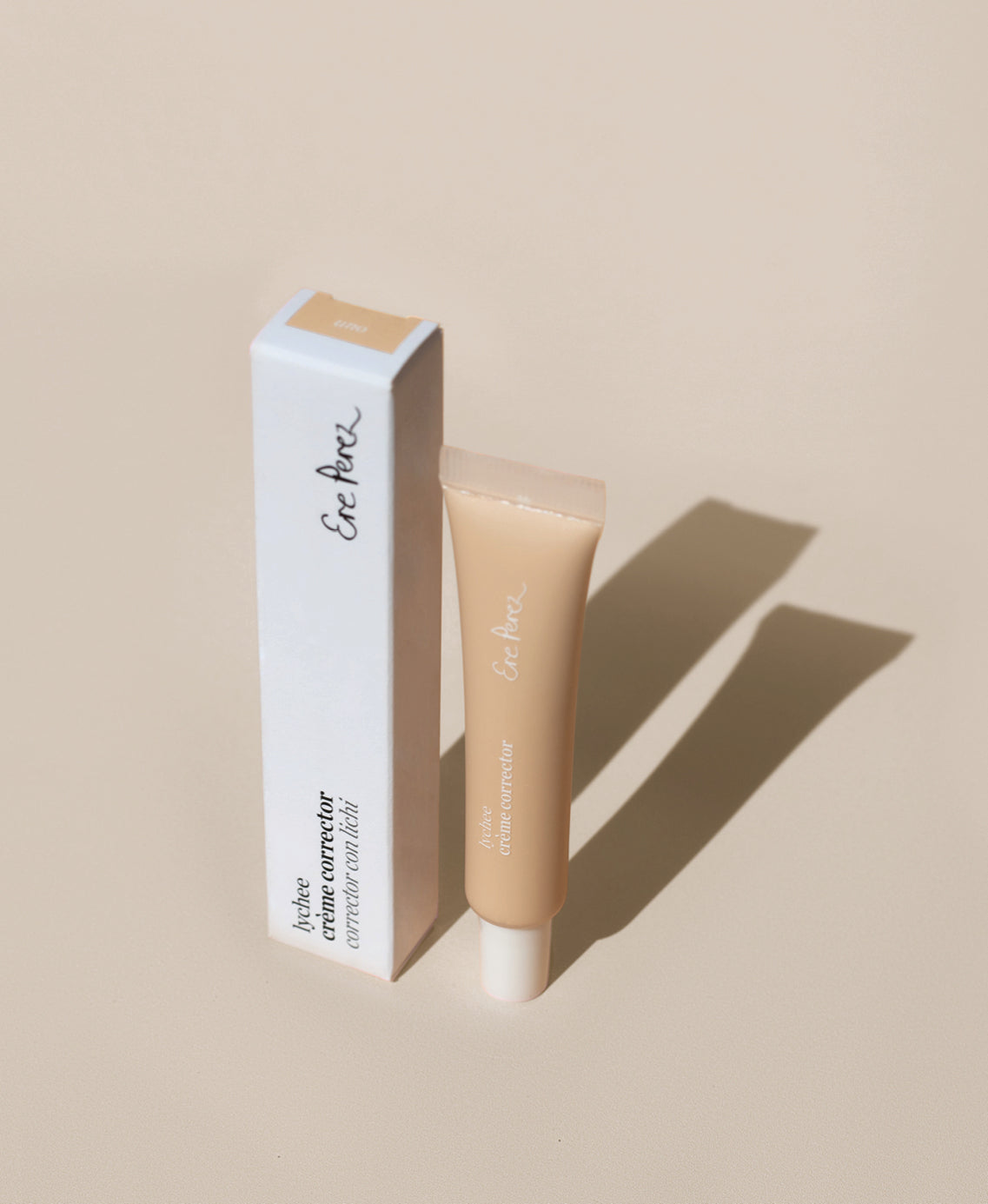 Natural lychee creme corrector bottle & box for bright & hydrated skin by Ere Perez