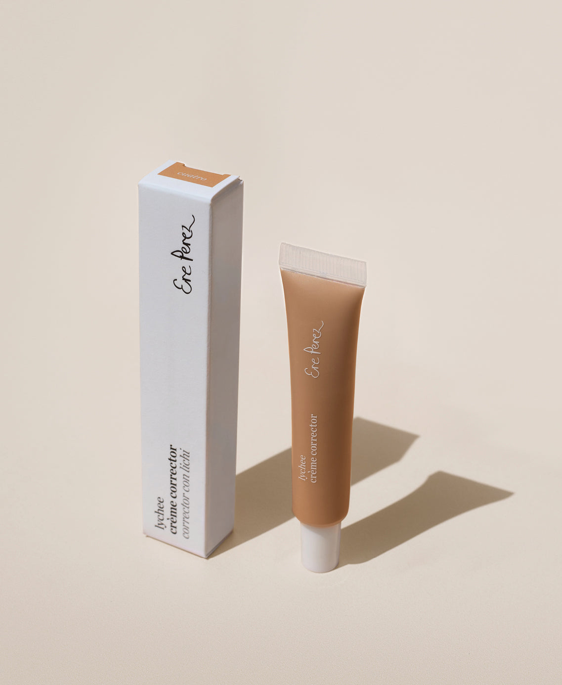 Natural lychee creme corrector bottle & box for bright skin by Ere Perez
