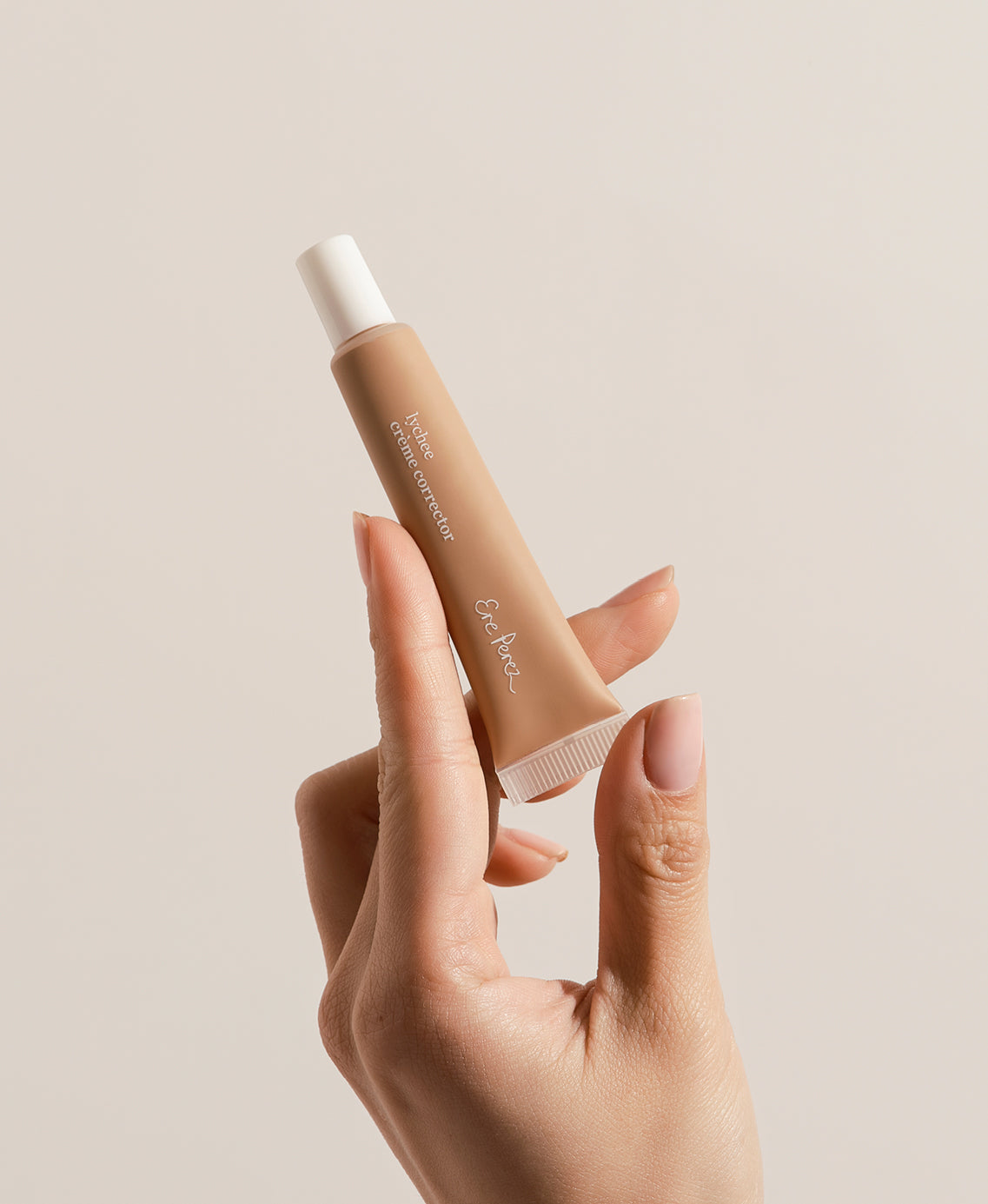 Bottle of lychee creme corrector for even and moisturised skin