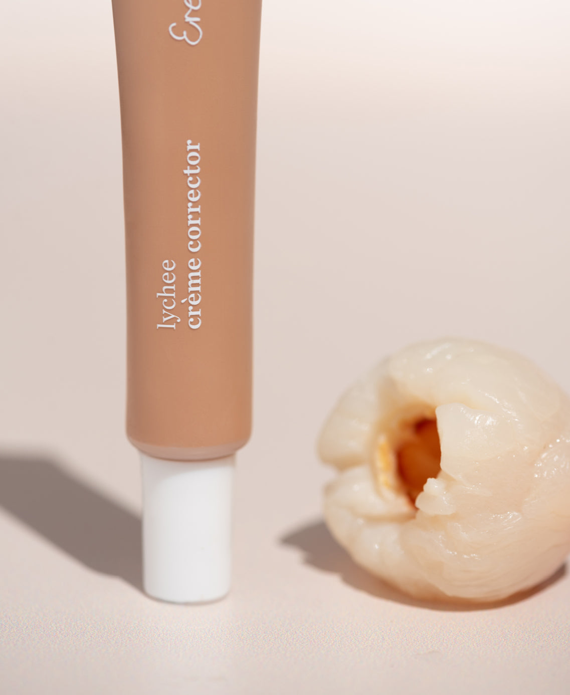Bottle of lychee creme corrector perfect to cover & hydrate your skin
