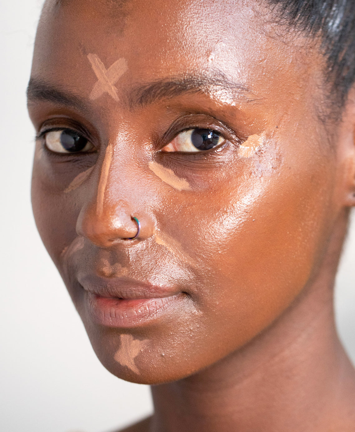 Natural lychee creme corrector applied on skin for a clear complexion and moisturised skin