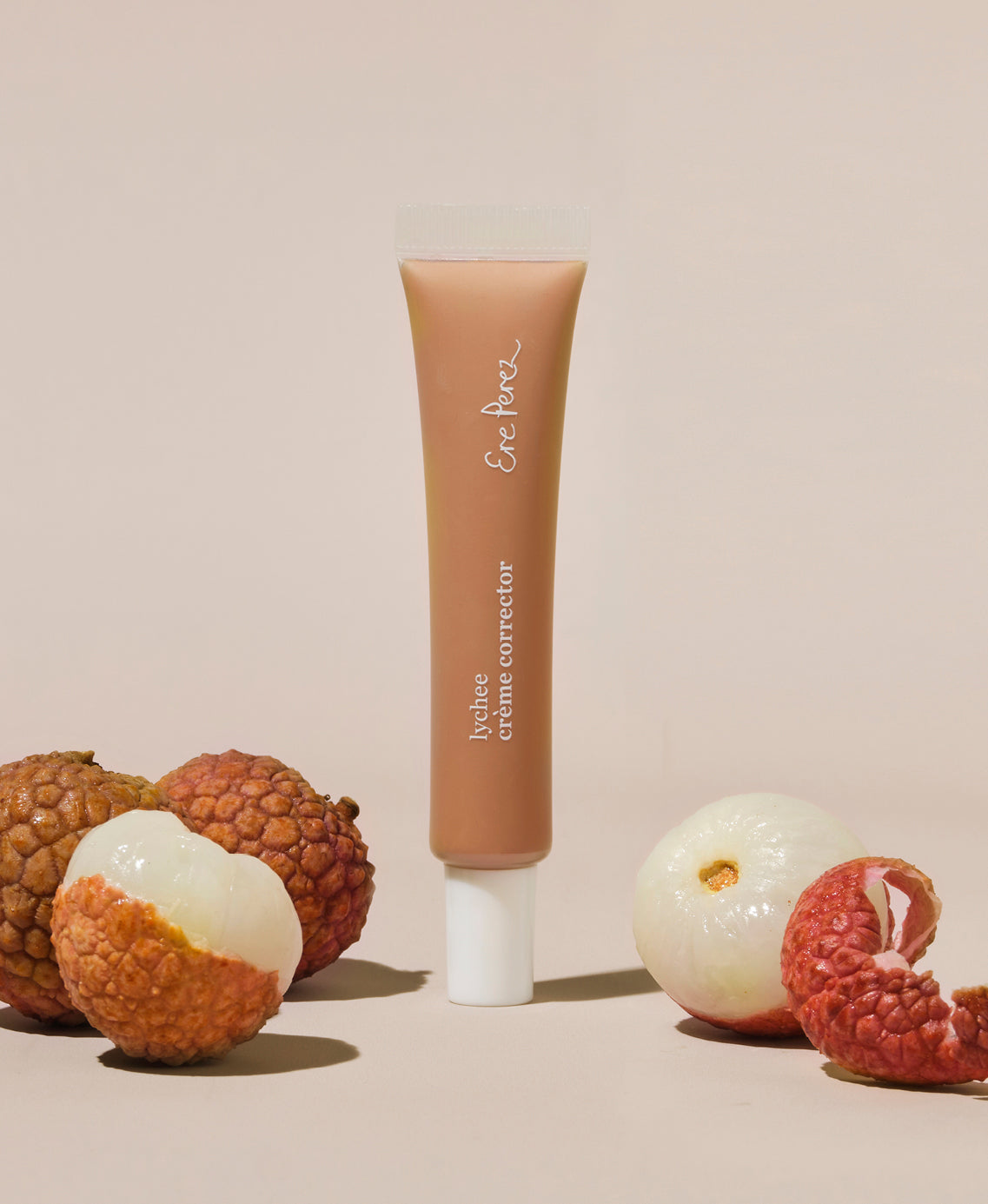 Bottle of lychee creme corrector for clear skin and refreshed look