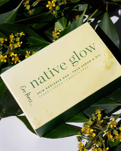 Native Glow skincare product packaging surrounded by green leaves and yellow flowers