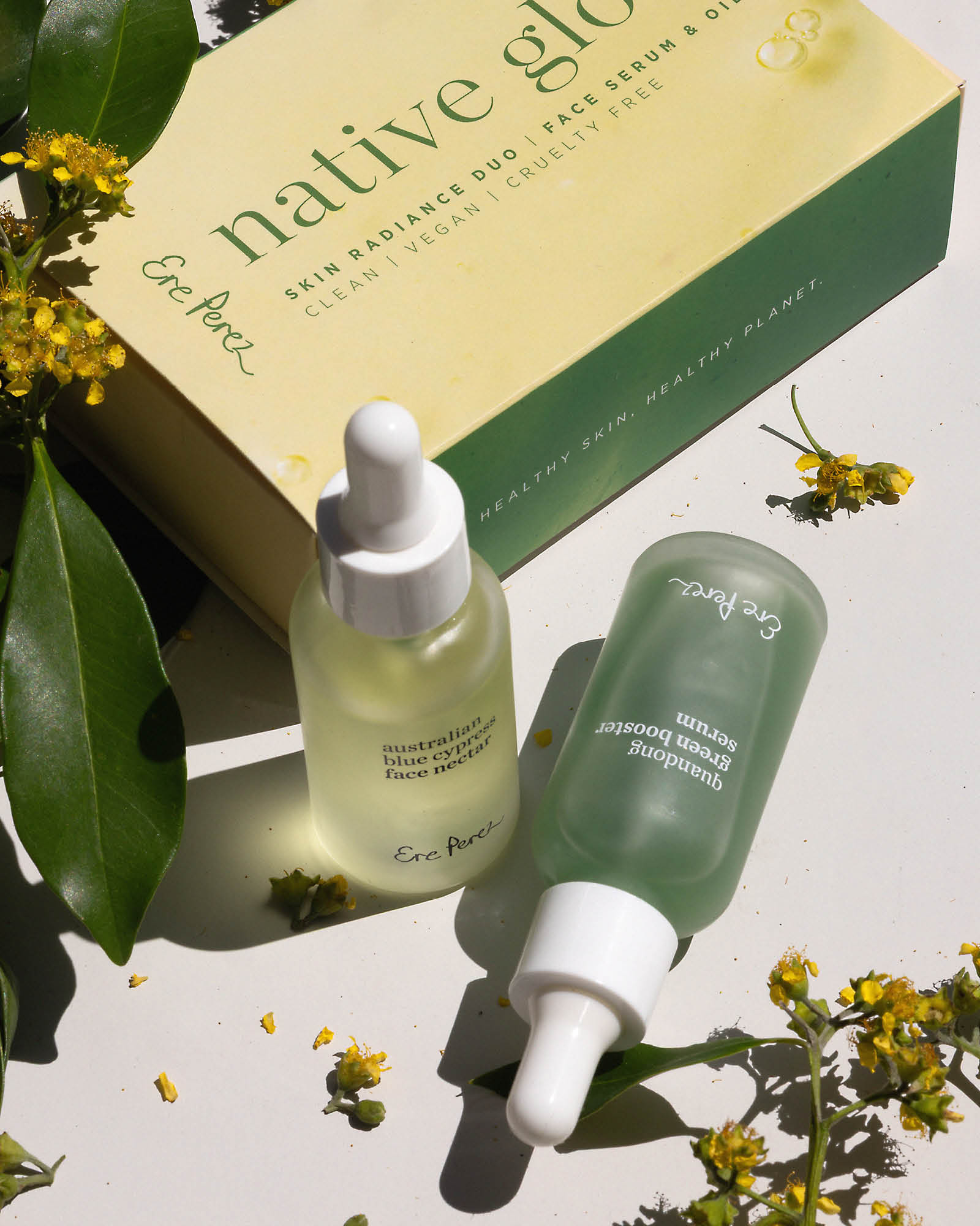 Two skincare droppers with a box labeled &
