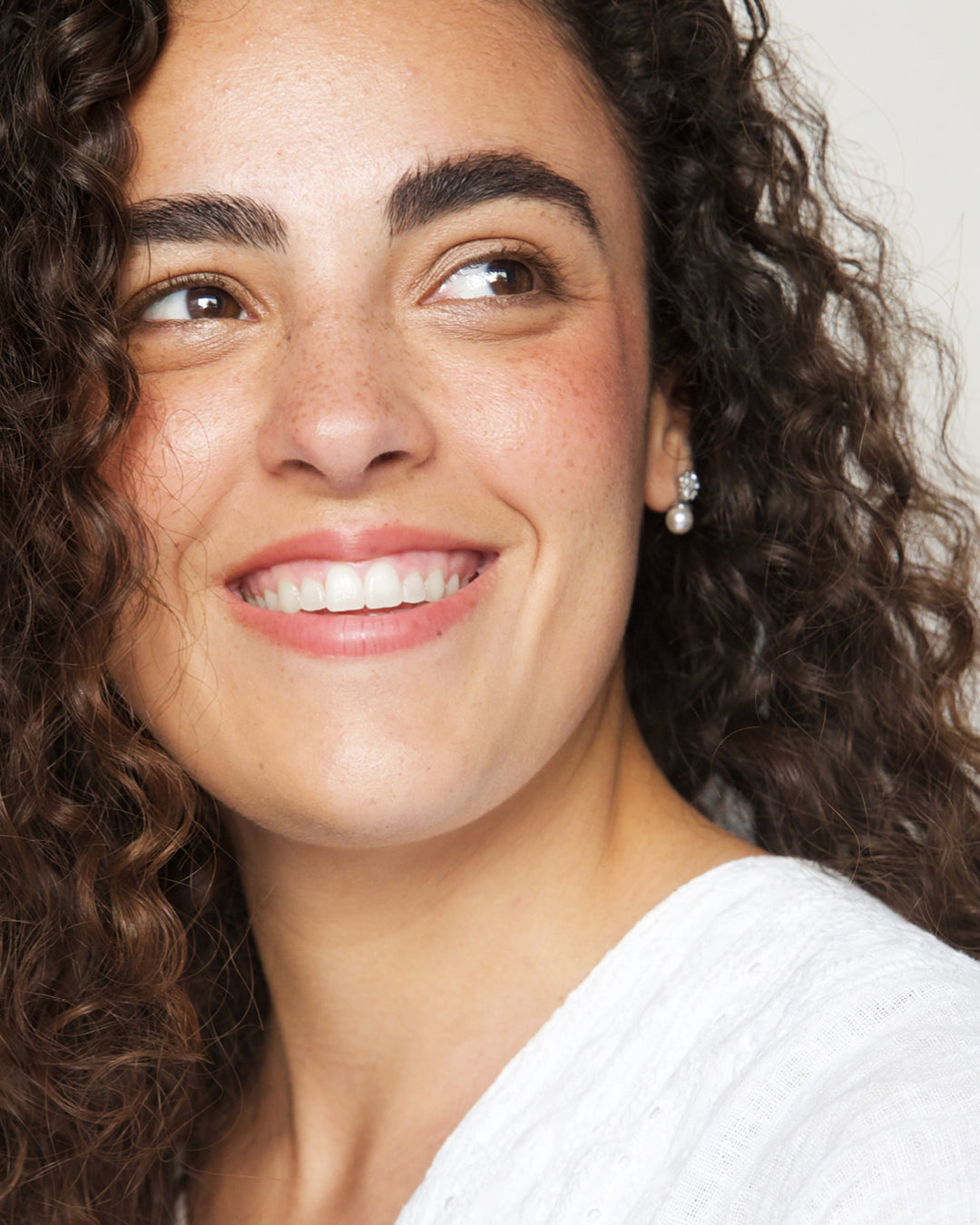 Organic natural almond mascara applied on the eyes for a lifted long-lasting effect