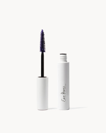 Eyelash mascara with white casing and black wand on a white background
