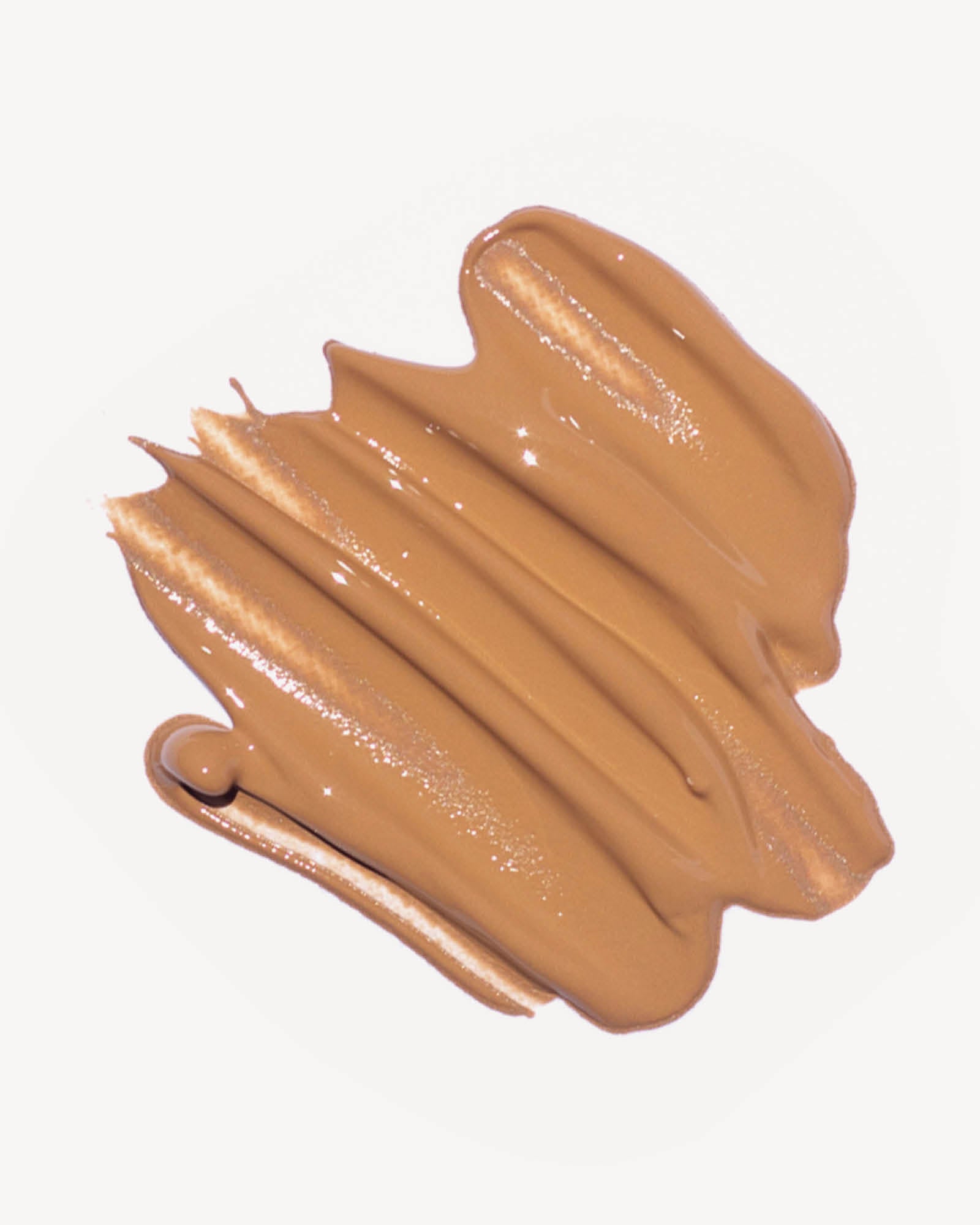 Foundation Swatch in the shade brew on a white background,