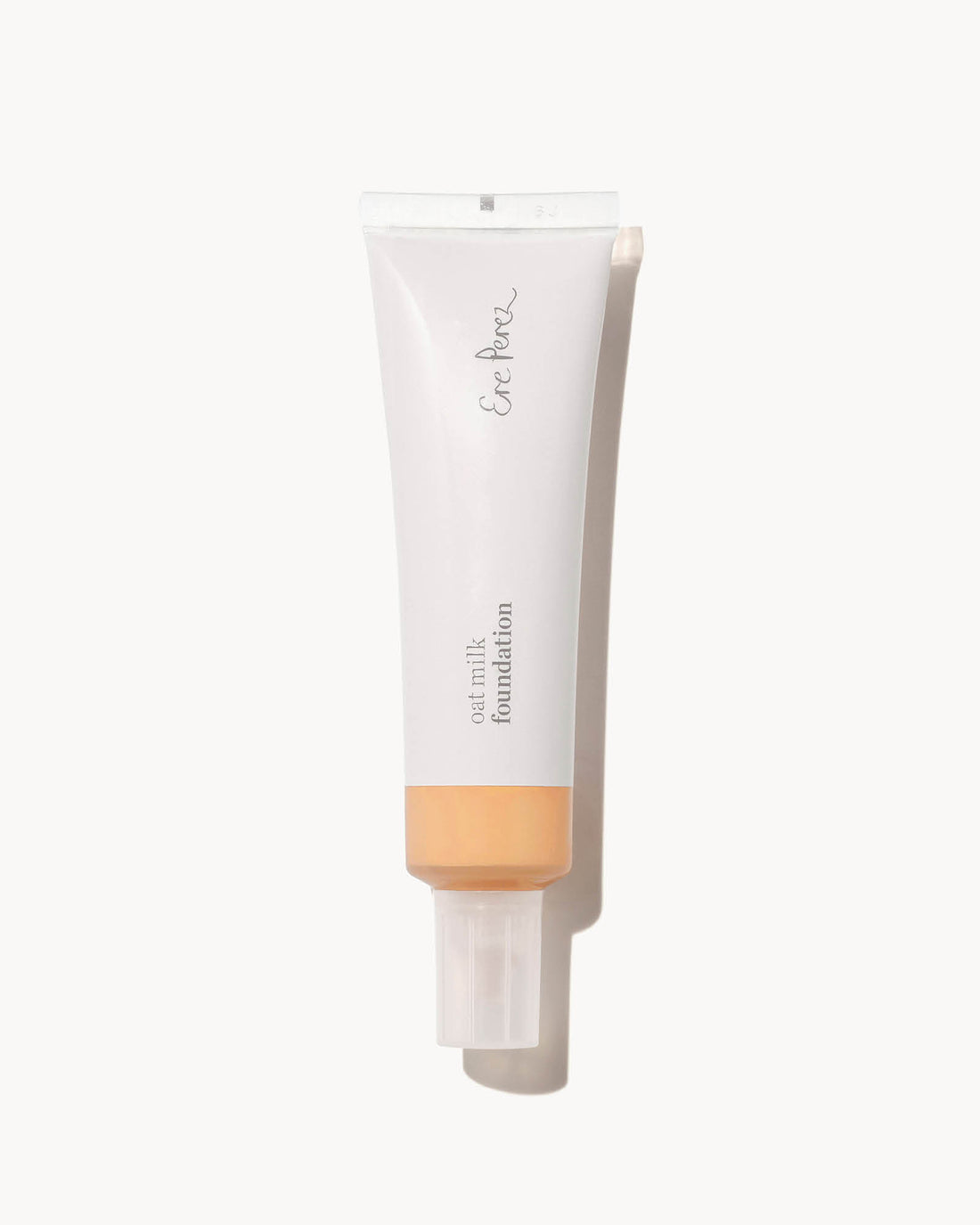 Foundation tube with a white cap on a white background in