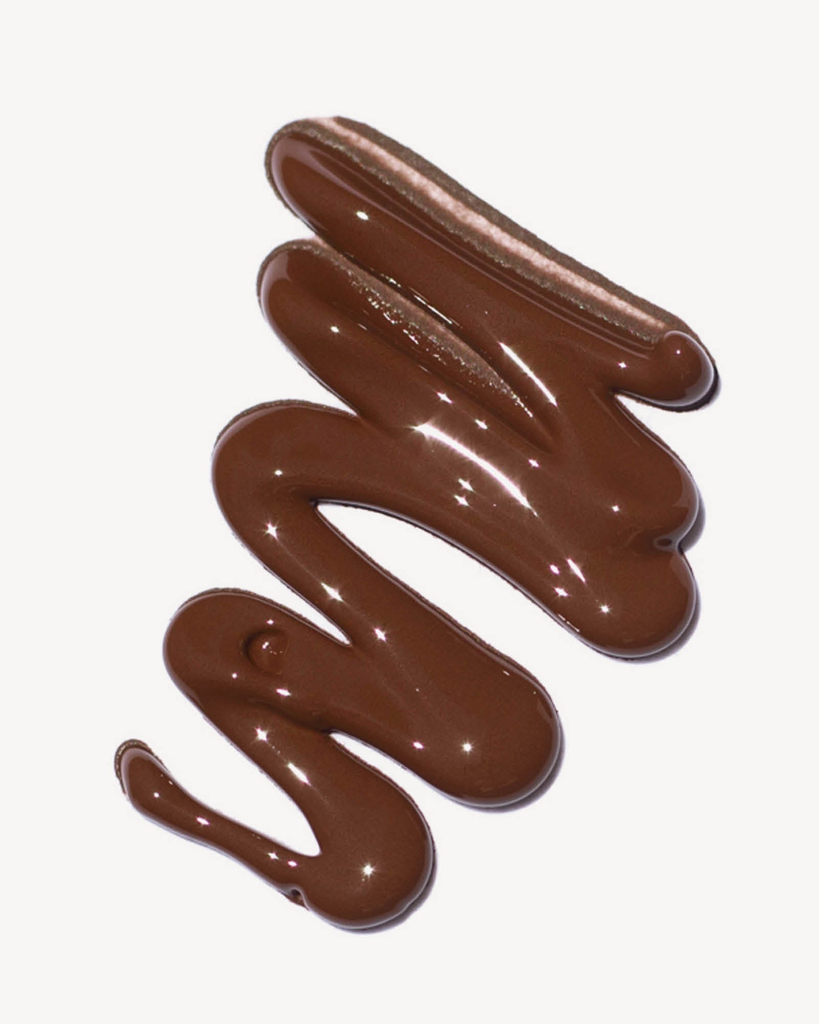 foundation swatch in the shade dolce on a white background,