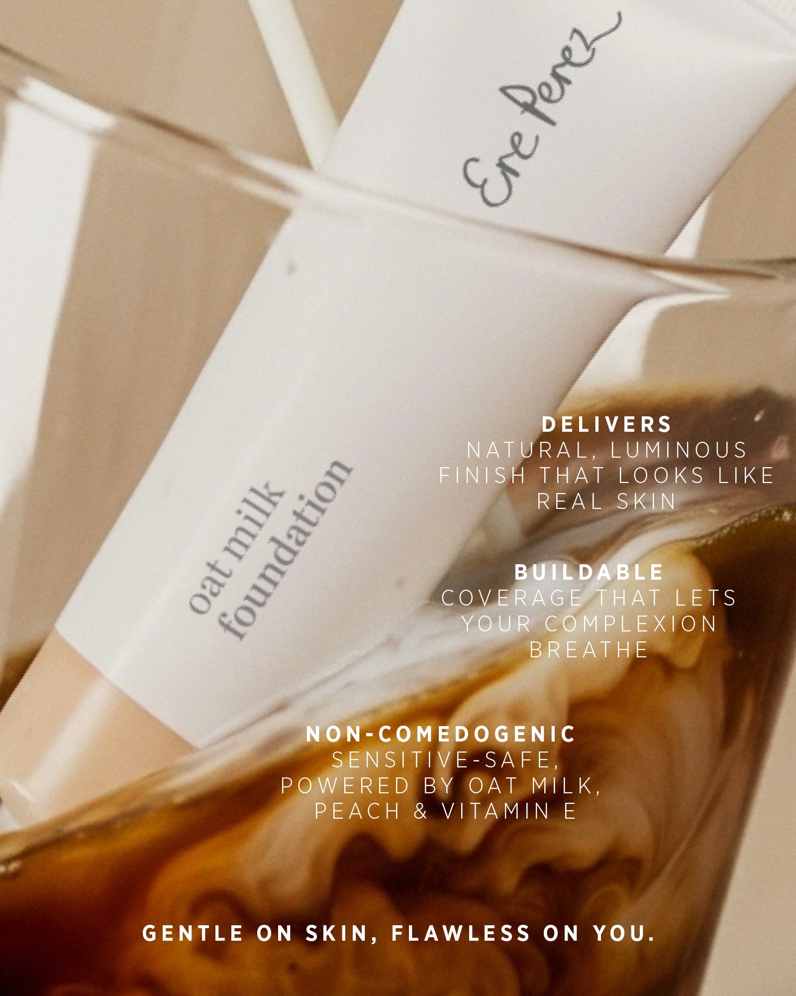 Ere Perez oat milk foundation bottle with text highlighting features on a blurred background,