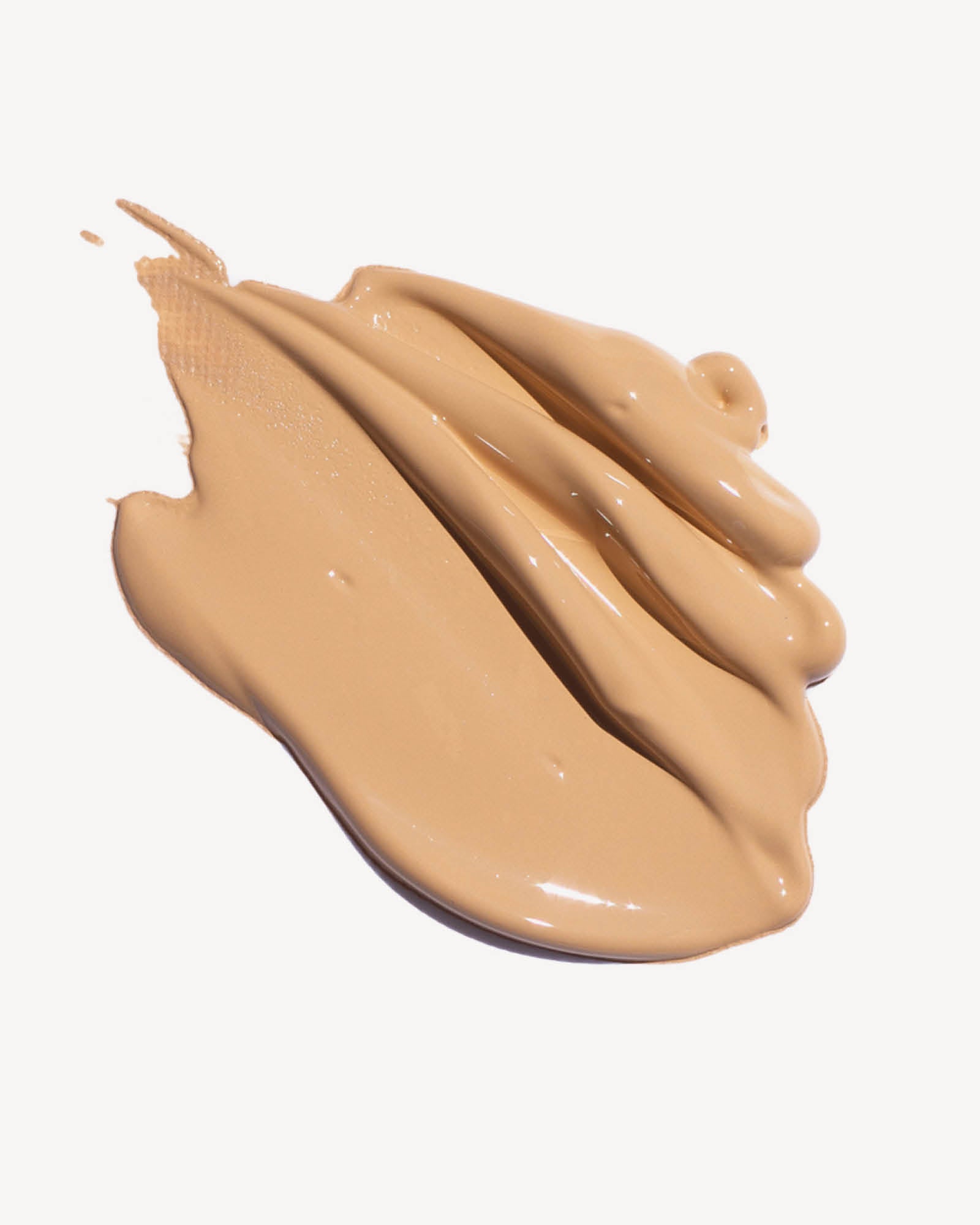 Beige foundation swatch in on a white background,