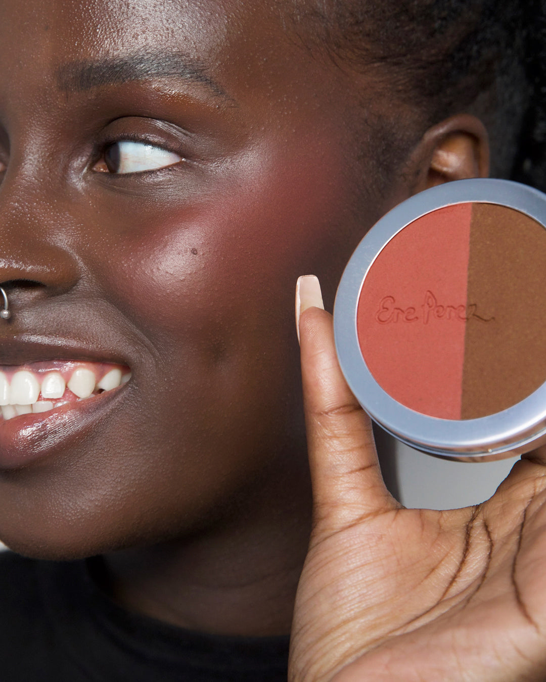 all-natural & gentle rice powder bronzer & blush in its wheel and applied on skin for rosy cheeks and shimmery skin