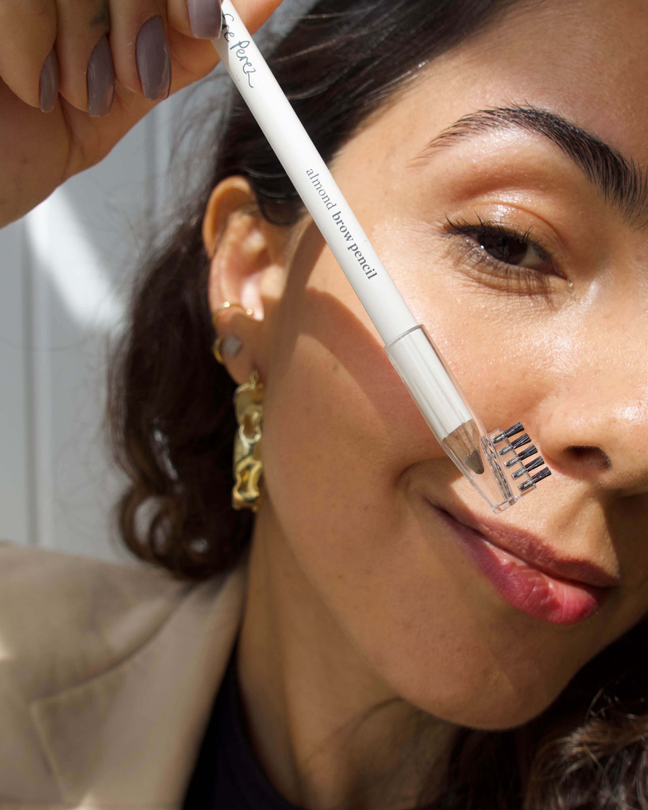 natural almond brow pencil - shade perfect by Ere Perez in its pencil & applied on the brow for a gentle definition
