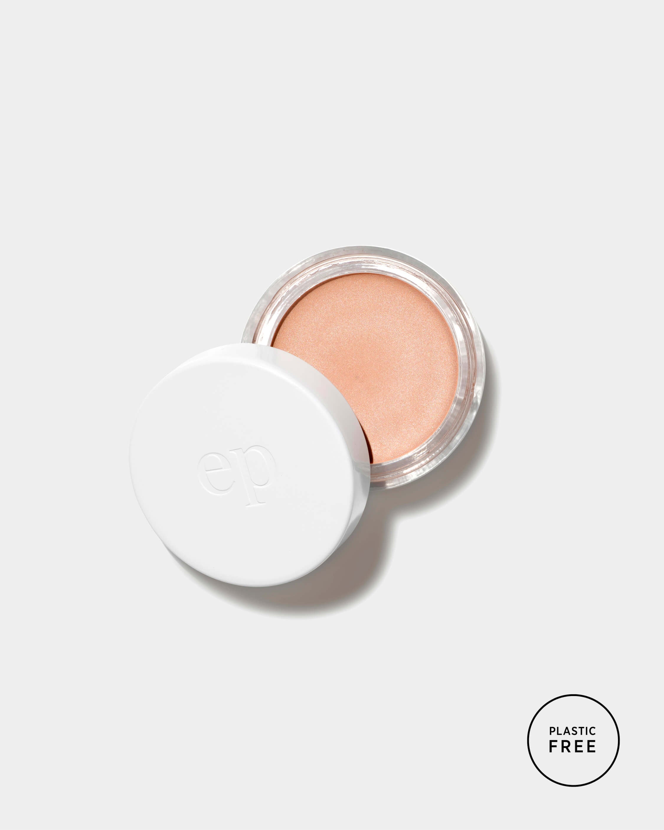 Pot of Ere Perez natural vanilla highlighter, in proudly plastic free packaging