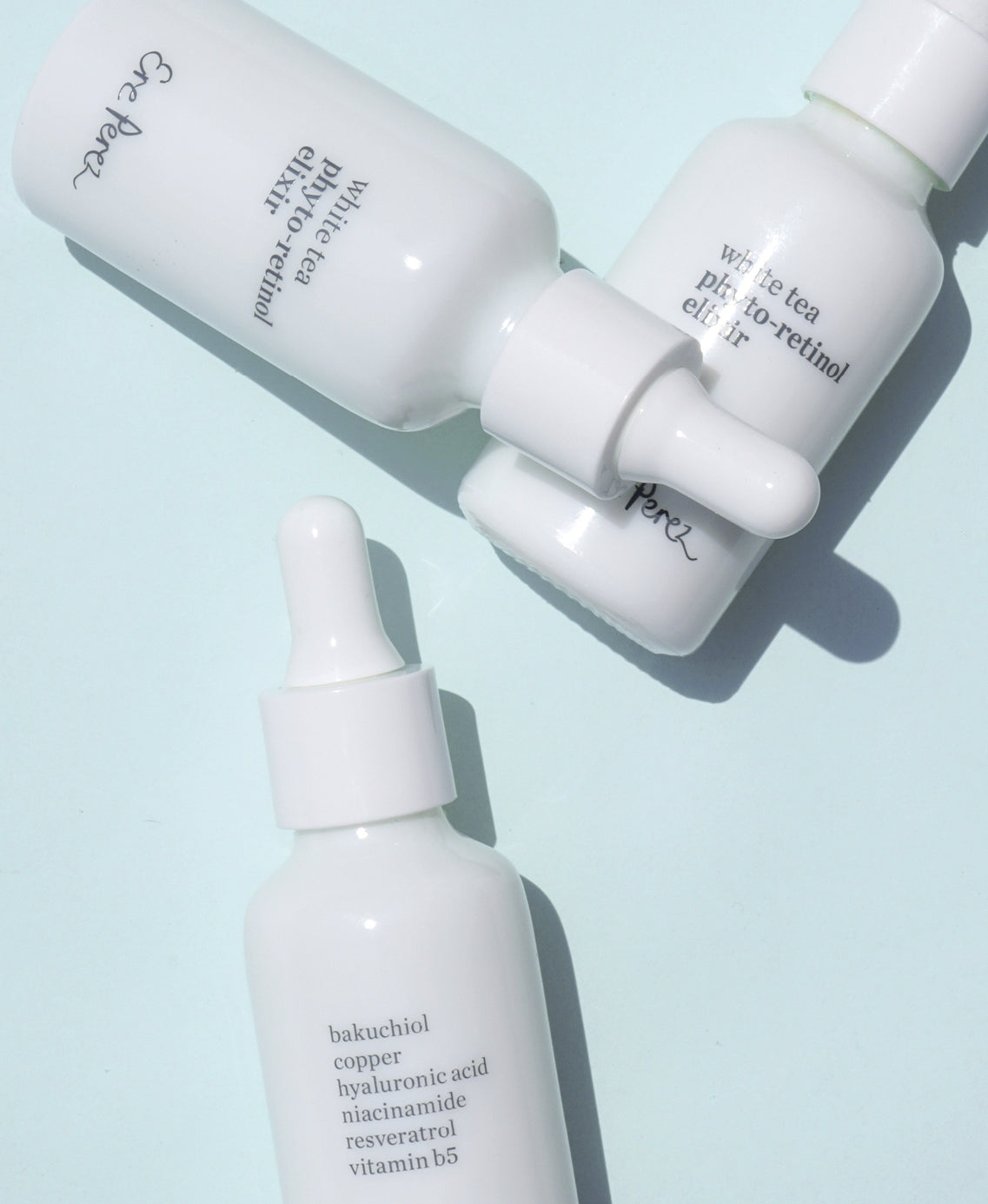 multiple recyclable bottles of white tea phyto-retinol elixir Ere Perez |