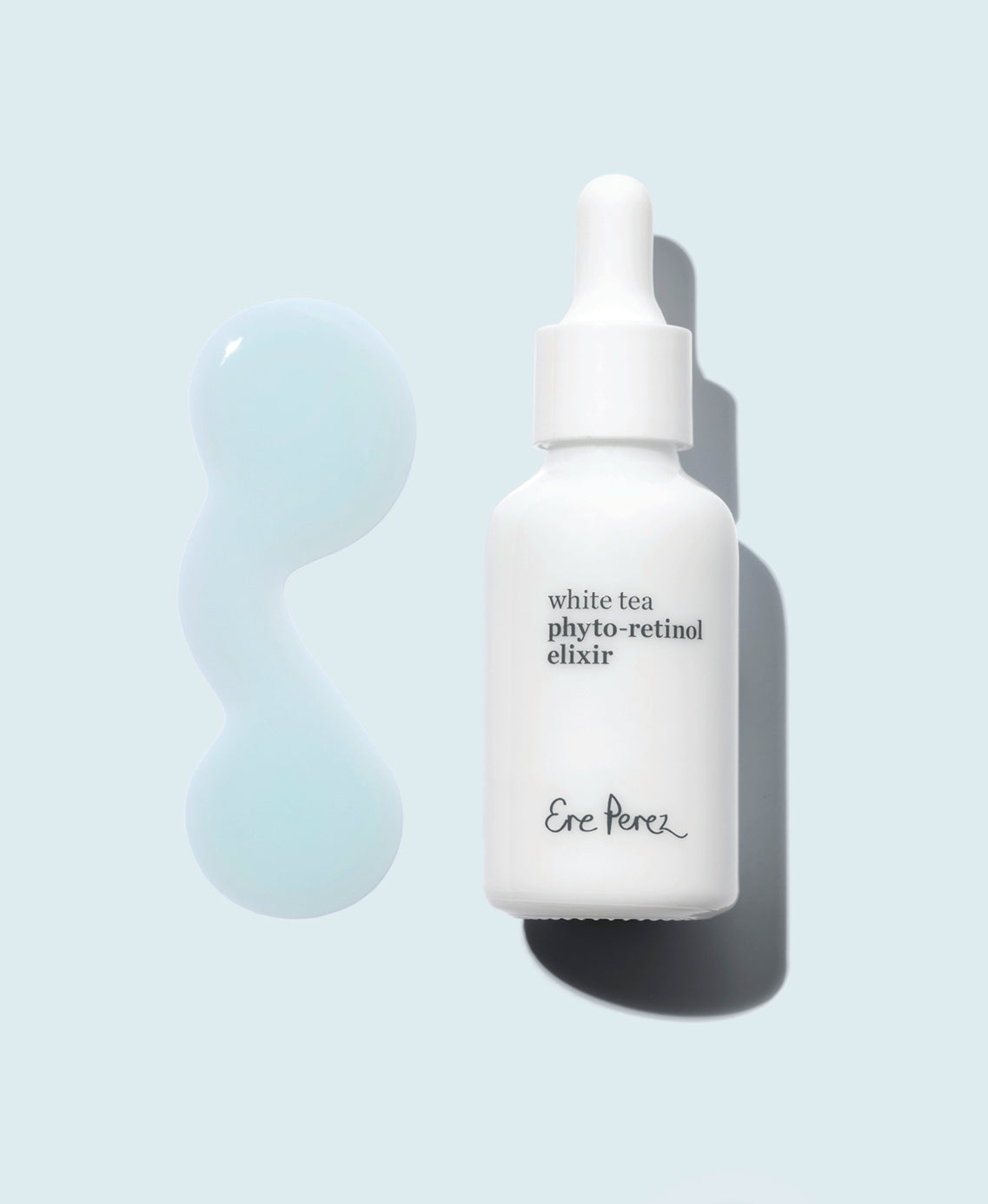 swatch and recyclable bottle of carbon-neutral white tea phyto-retinol elixir by Ere Perez |