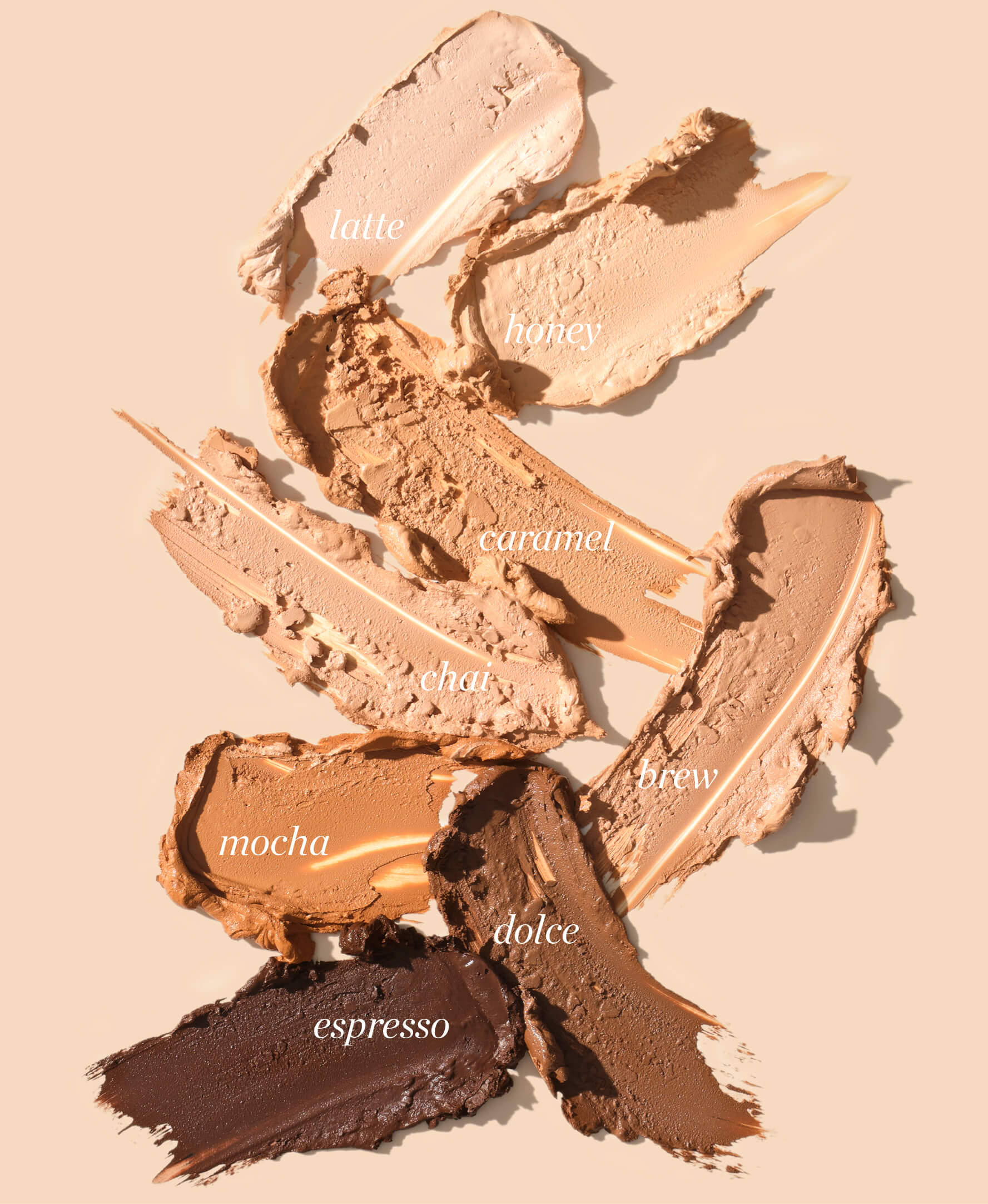 Swatches of various shades of nourishing and vegan arnica all-cover foundation