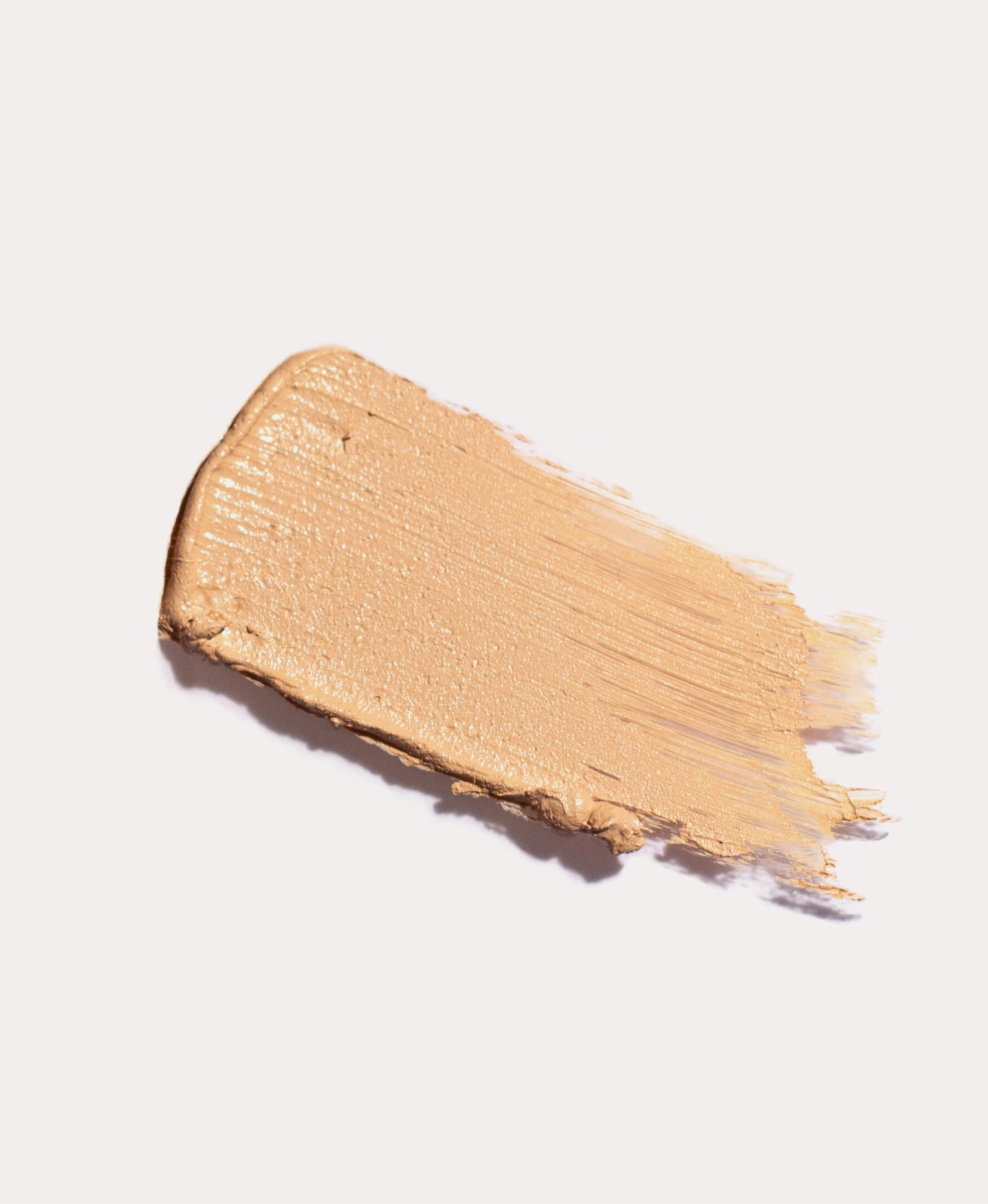 Swatch of organic & delicate arnica all-cover concealer Ere Perez