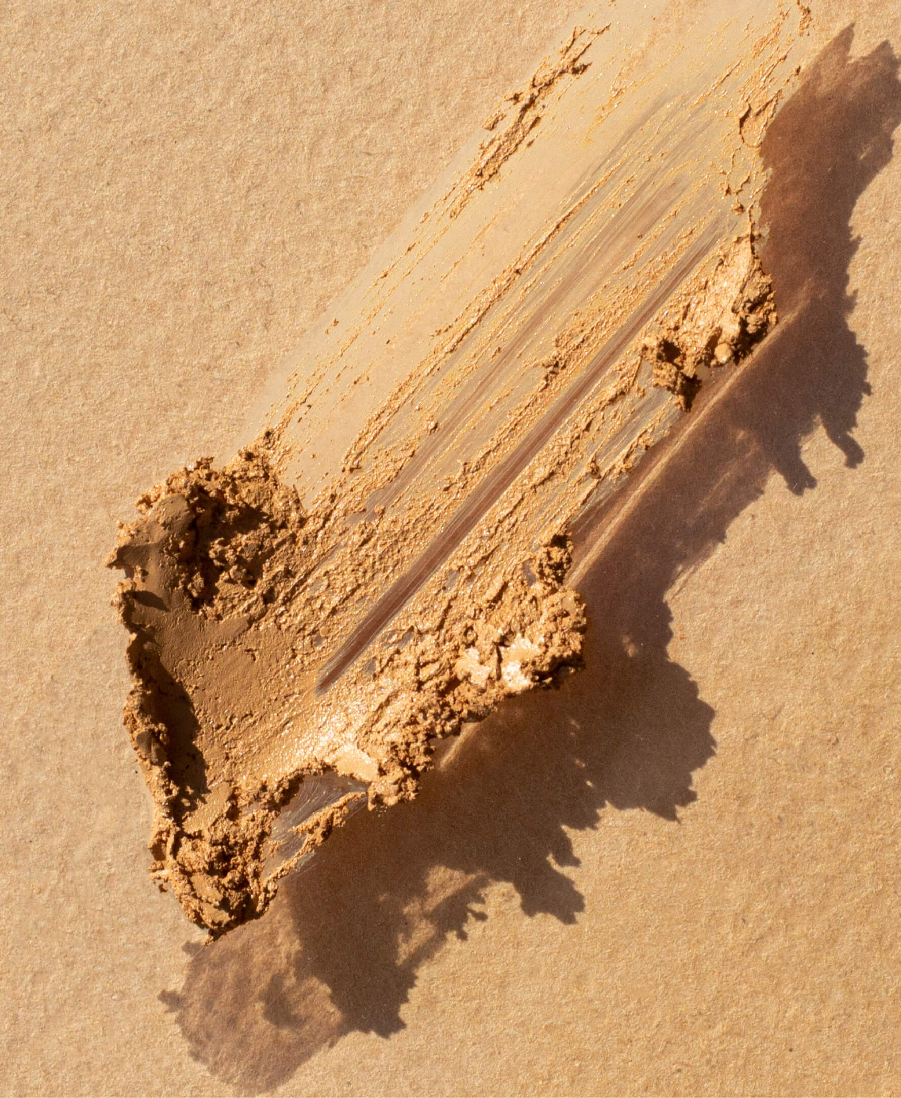 swatch of organic arnica all-cover concealer