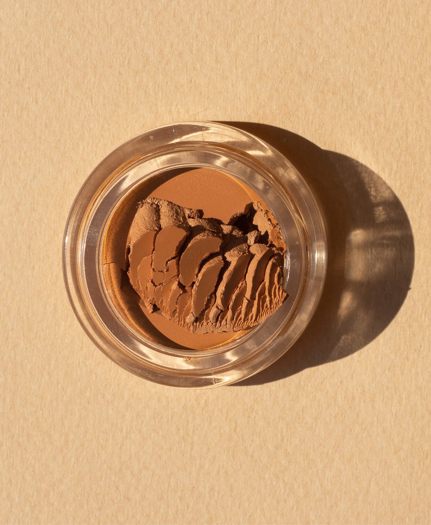 Pot of all natural arnica concealer by Ere Perez