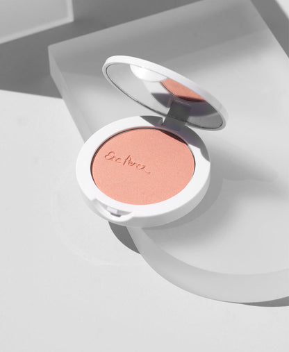 compact of organic tapioca cheek colour by Ere Perez in its refillable packaging with a mirror for easy & precise usage