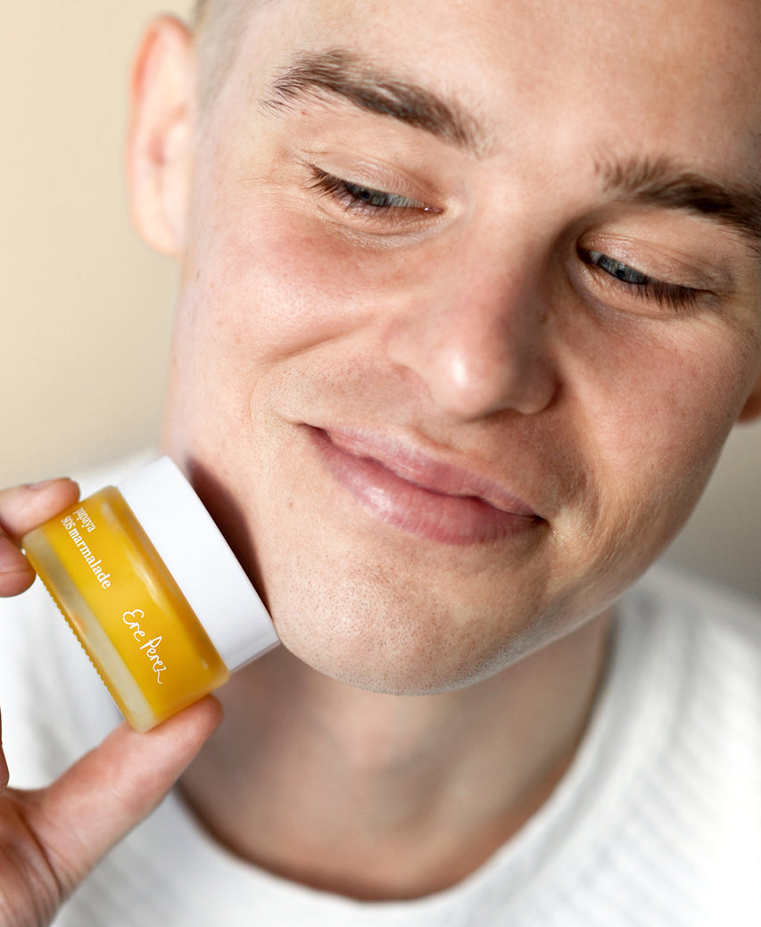 clean papaya SOS marmalade Ere Perez in its recyclable pot and applied on skin for natural and nourishing benefits