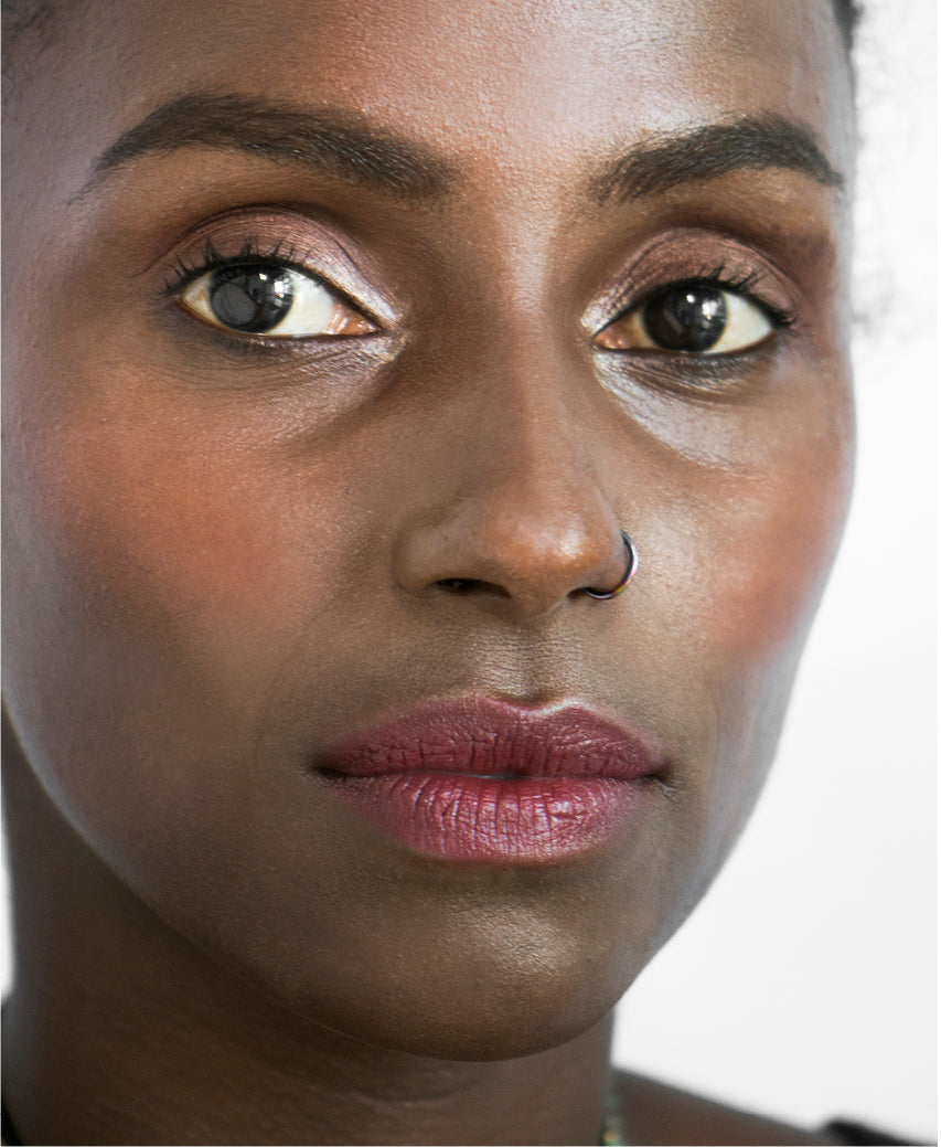 natural almond brow pencil - shade perfect by Ere Perez applied on the brow for defined hydrated brows