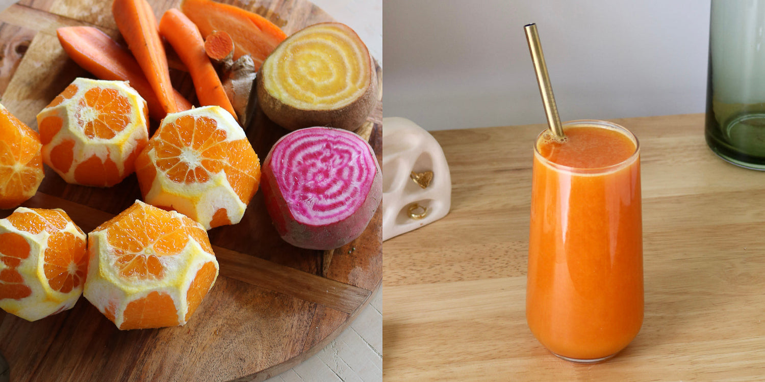 Oranges on a table with orange juice in a glass
