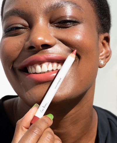 gentle moisturising coco crayon by Ere Perez applied on skin and in its waste-free crayon for a natural long-lasting colour   