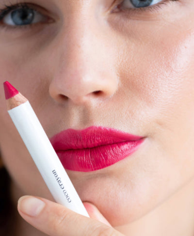 smooth hydrating coco crayon by Ere Perez applied on sensitive skin and in its plastic-free crayon for a vivid long-lasting colour 