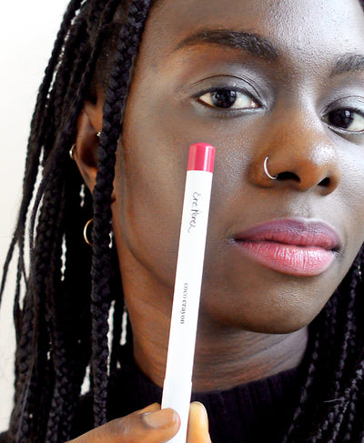 smooth hydrating coco crayon by Ere Perez applied on sensitive skin and in its waste-free crayon for a natural healthy complexion 