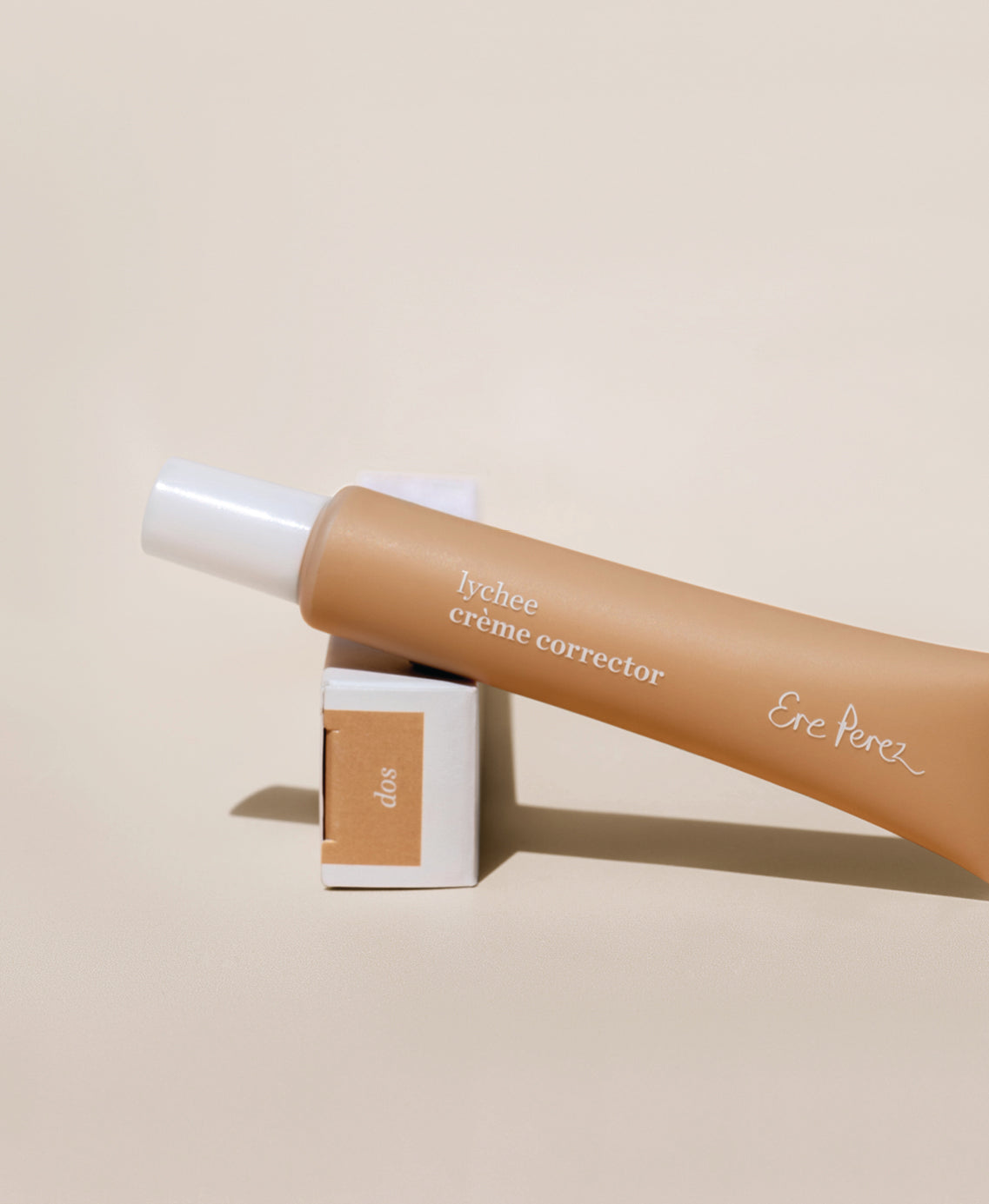 Organic lychee creme corrector bottle &amp; box for even skin by Ere Perez  