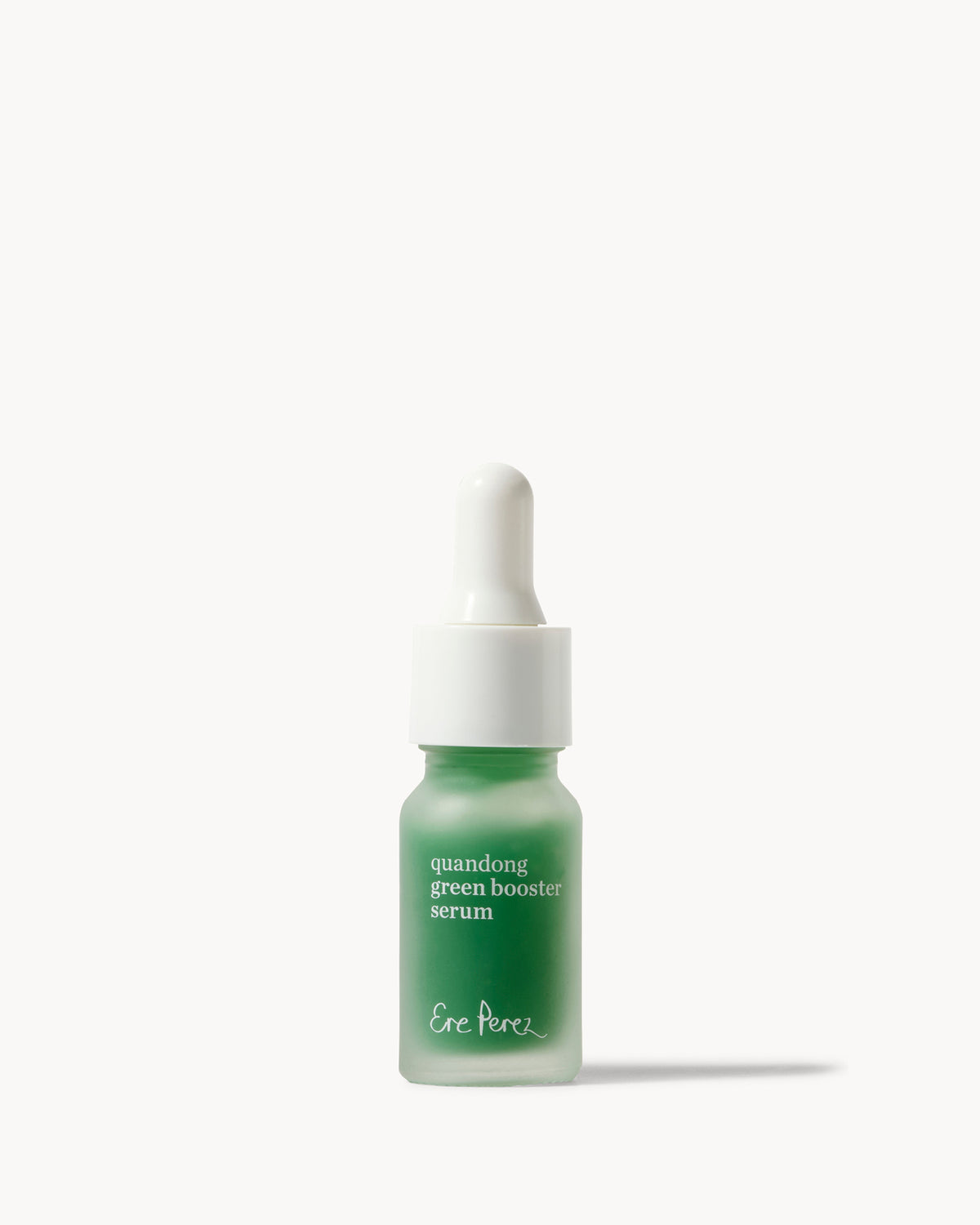 A small dropper bottle of Ere perez Quandong Green Booster Serum with a frosted green glass bottle and a white dropper cap, centered on a clean off-white background 
