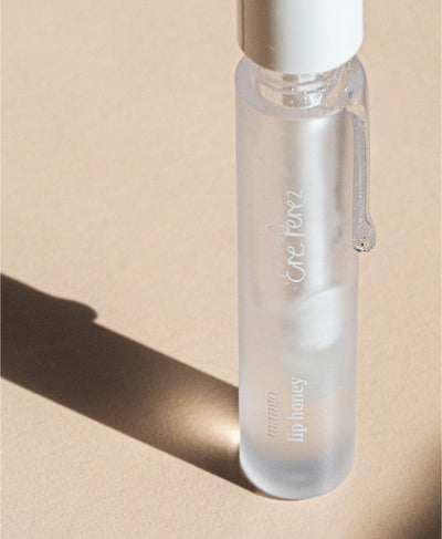 clear vegan mango lip honey Ere Perez in its bottle 