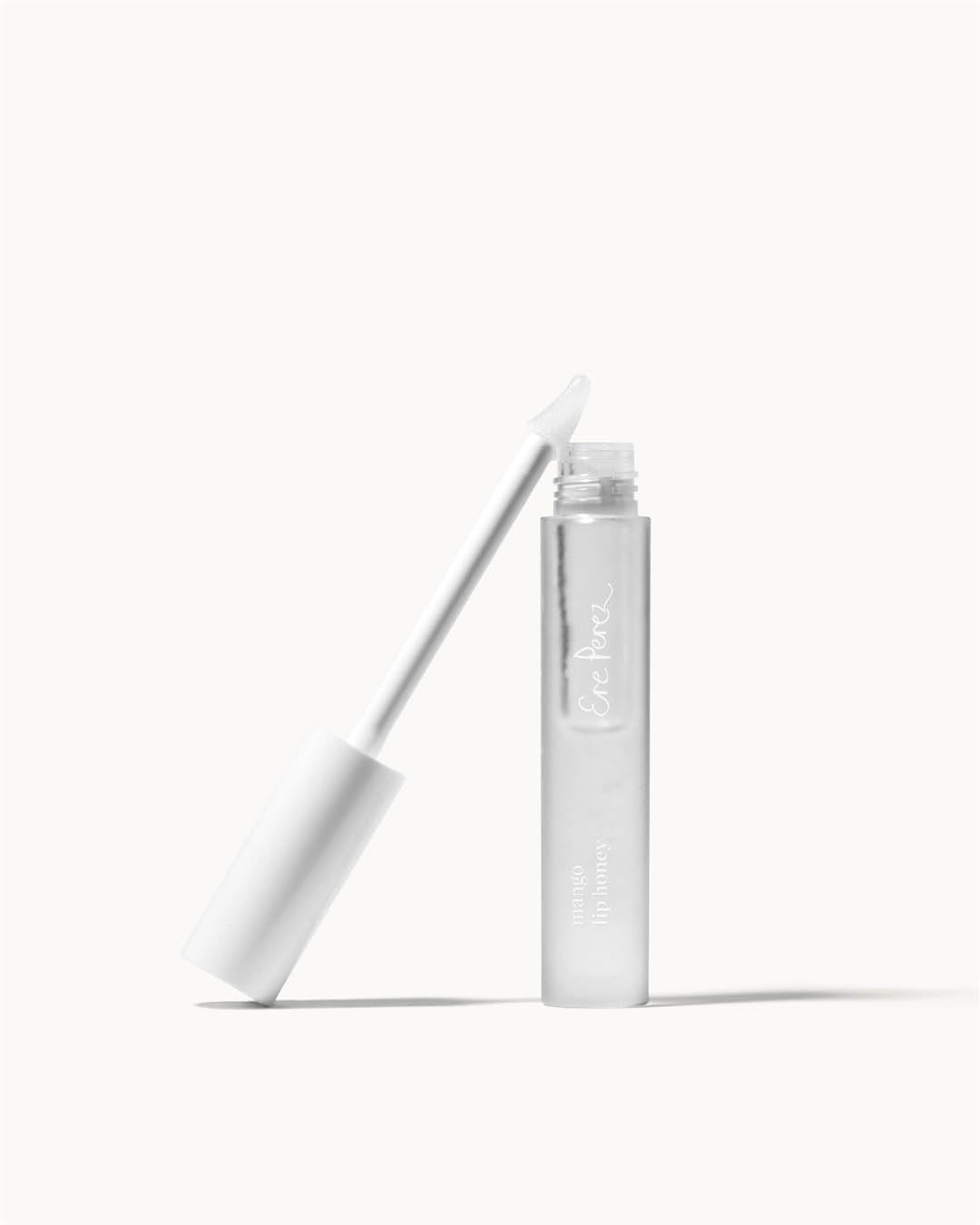 clear natural mango lip honey in its bottle 