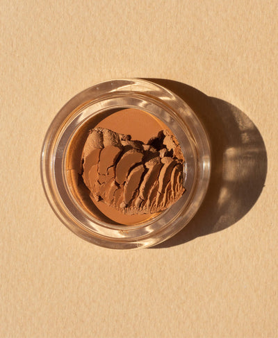 Pot of all natural arnica concealer by Ere Perez 