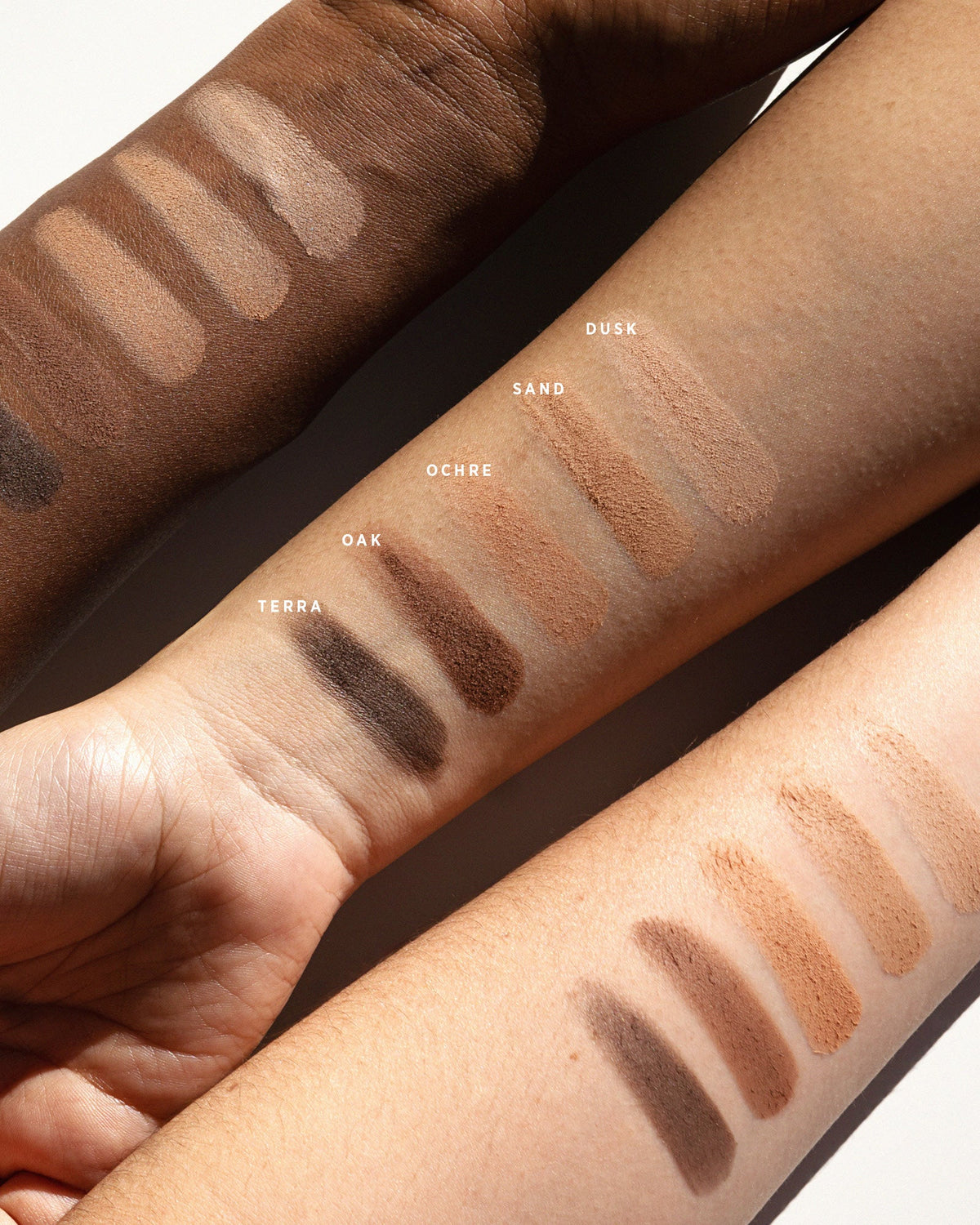 Element Matte neutral eyeshadow swatches on three skin tones. 