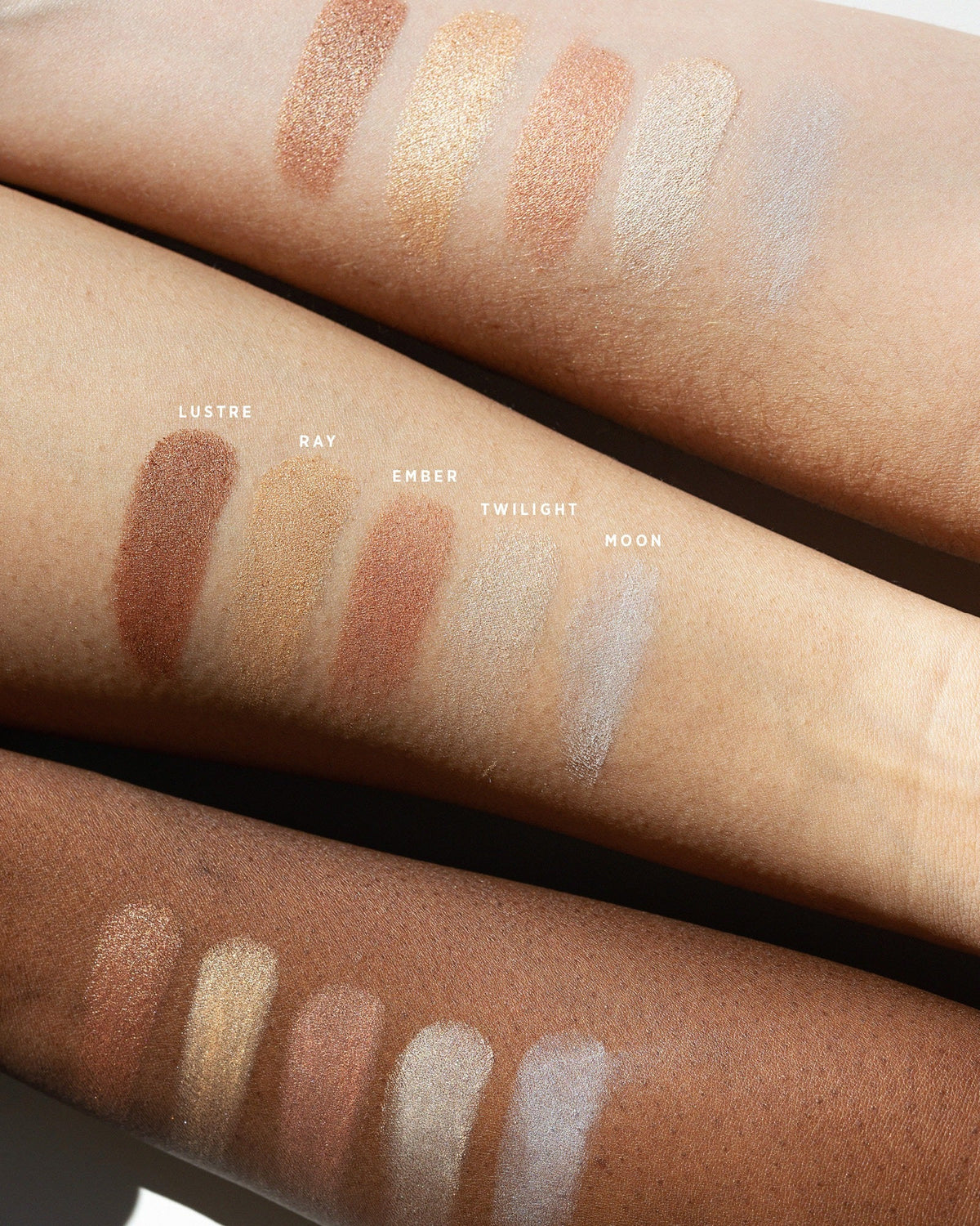Light Shimmer Moon Twilight Ember Ray and Lustre swatches on varied skin tones. 