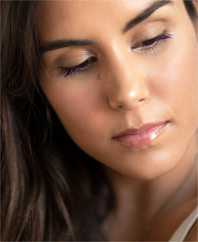 eco-friendly mango lip honey by Ere Perez applied on the lips for a moisturising shine  